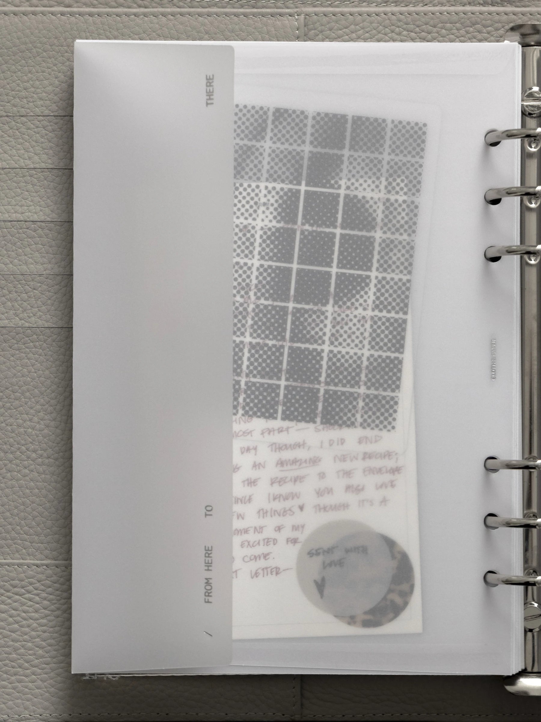 White Envelope Storage Holder shown in use with additional Cloth & Paper products.