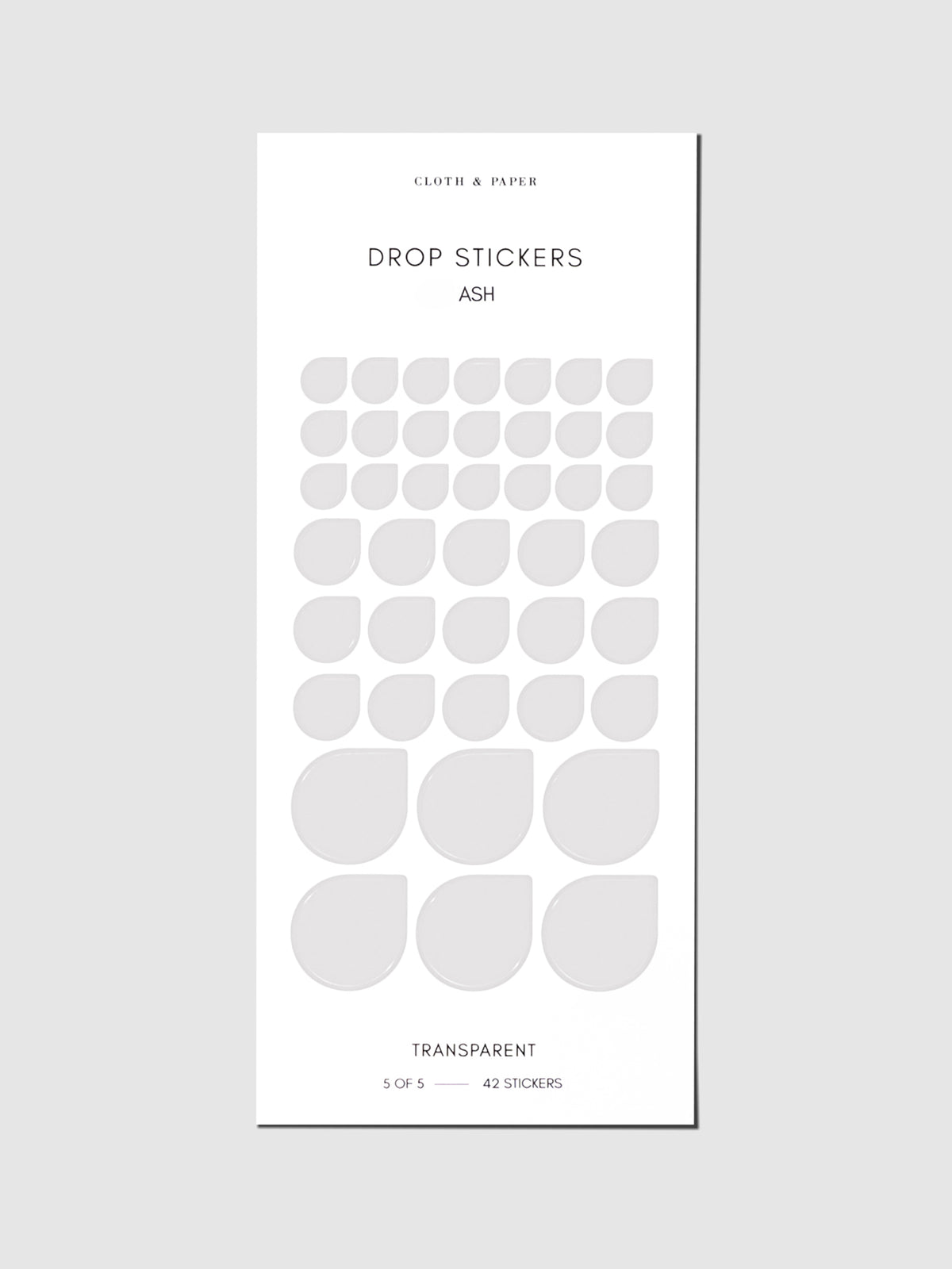 Sticker sheet displayed on a neutral background. Sticker sizes shown are mixed with small, medium, and large; color shown is Ash.