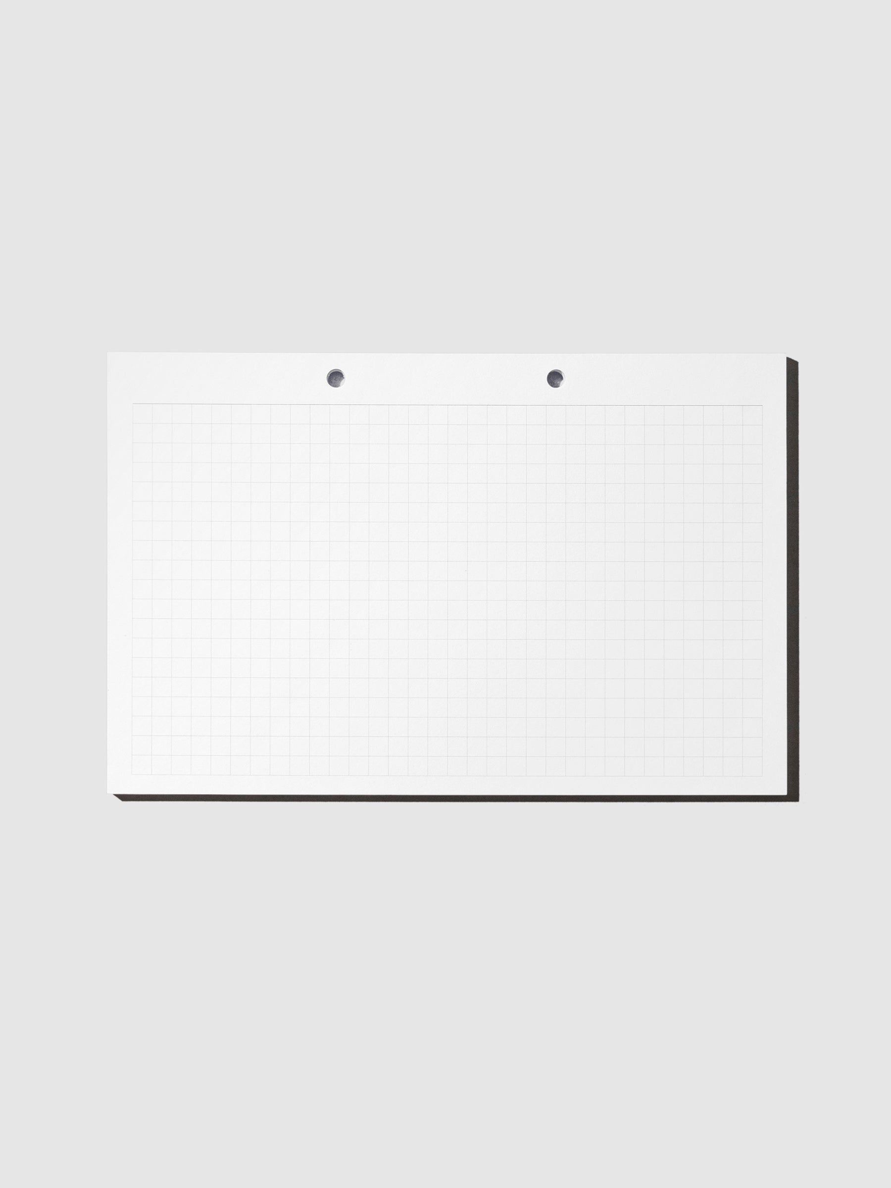 Modern Bound Notepad Insert Refills, graph, resting on a light gray background