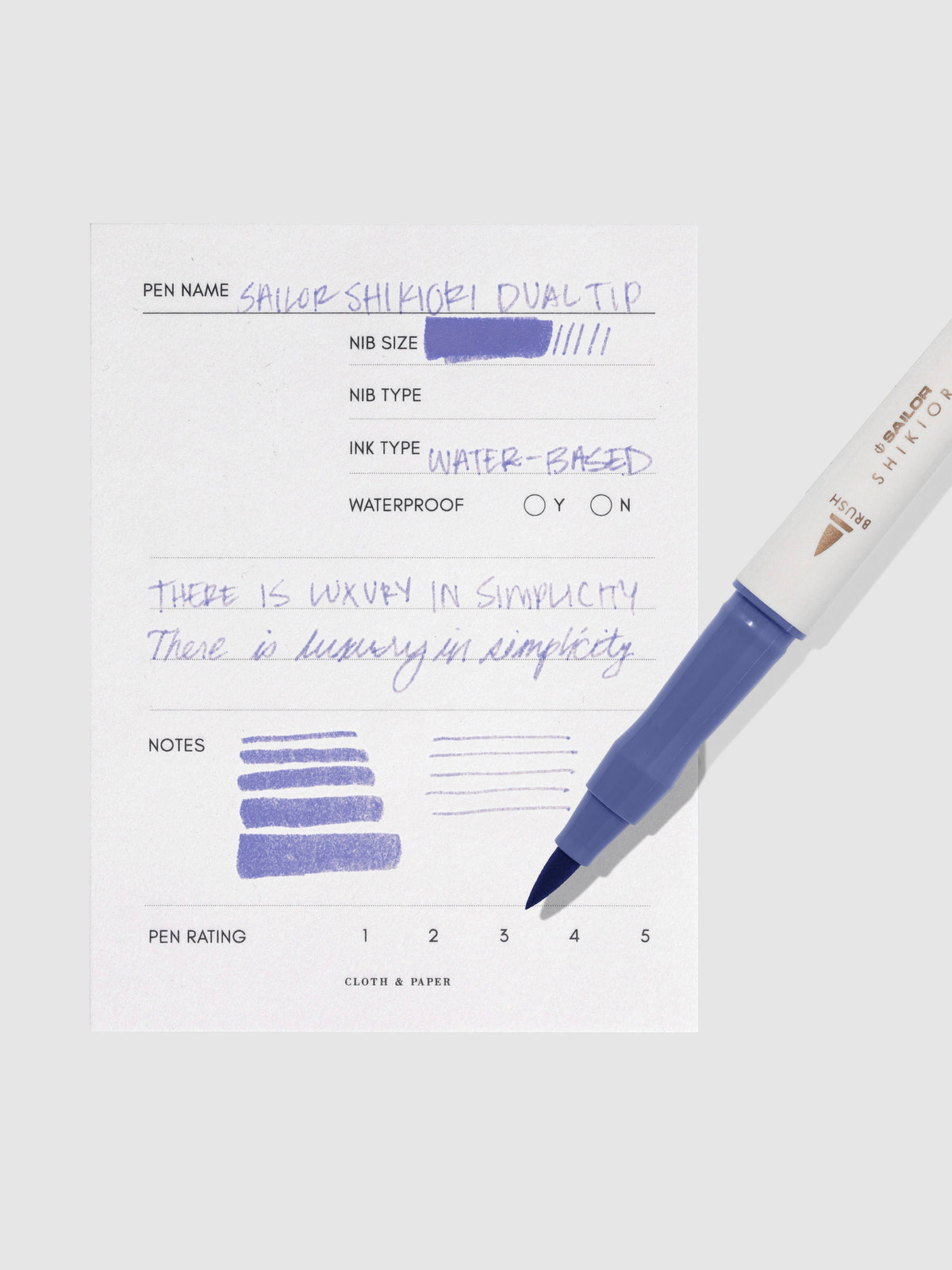 Pen displayed next to in use pen test sheet. Color pictured is Nioisumire.
