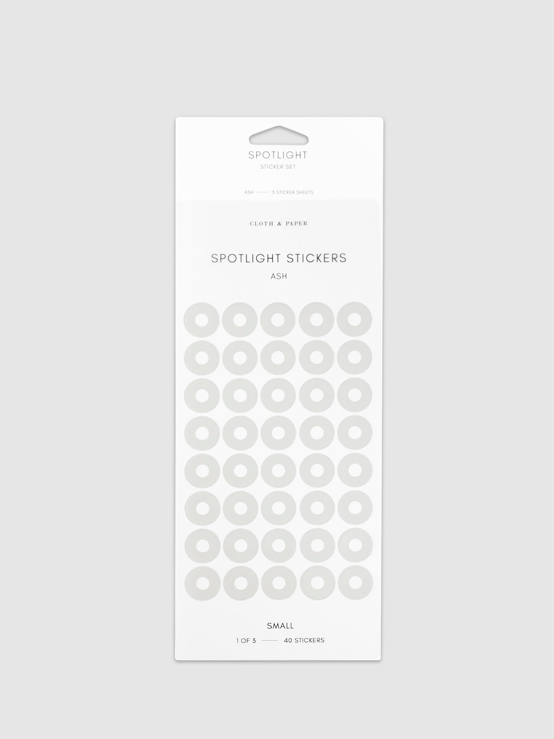Ash sticker in its packaging displayed on a neutral background. Pictured color is small.