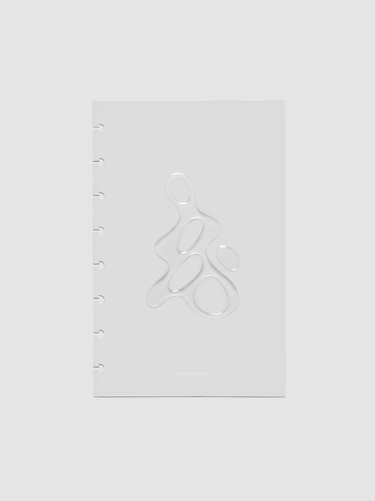 Light grey, semi-transparent, and glossy plastic planner dashboard with organic raised shape design in size Half Letter on a neutral background.