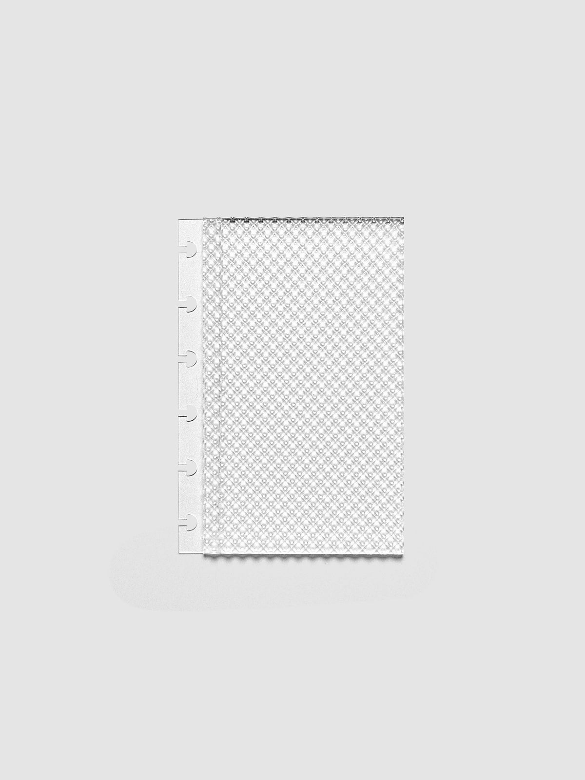 Clear, textured Studded Planner Dashboard in the size CP Petite, on a neutral background.