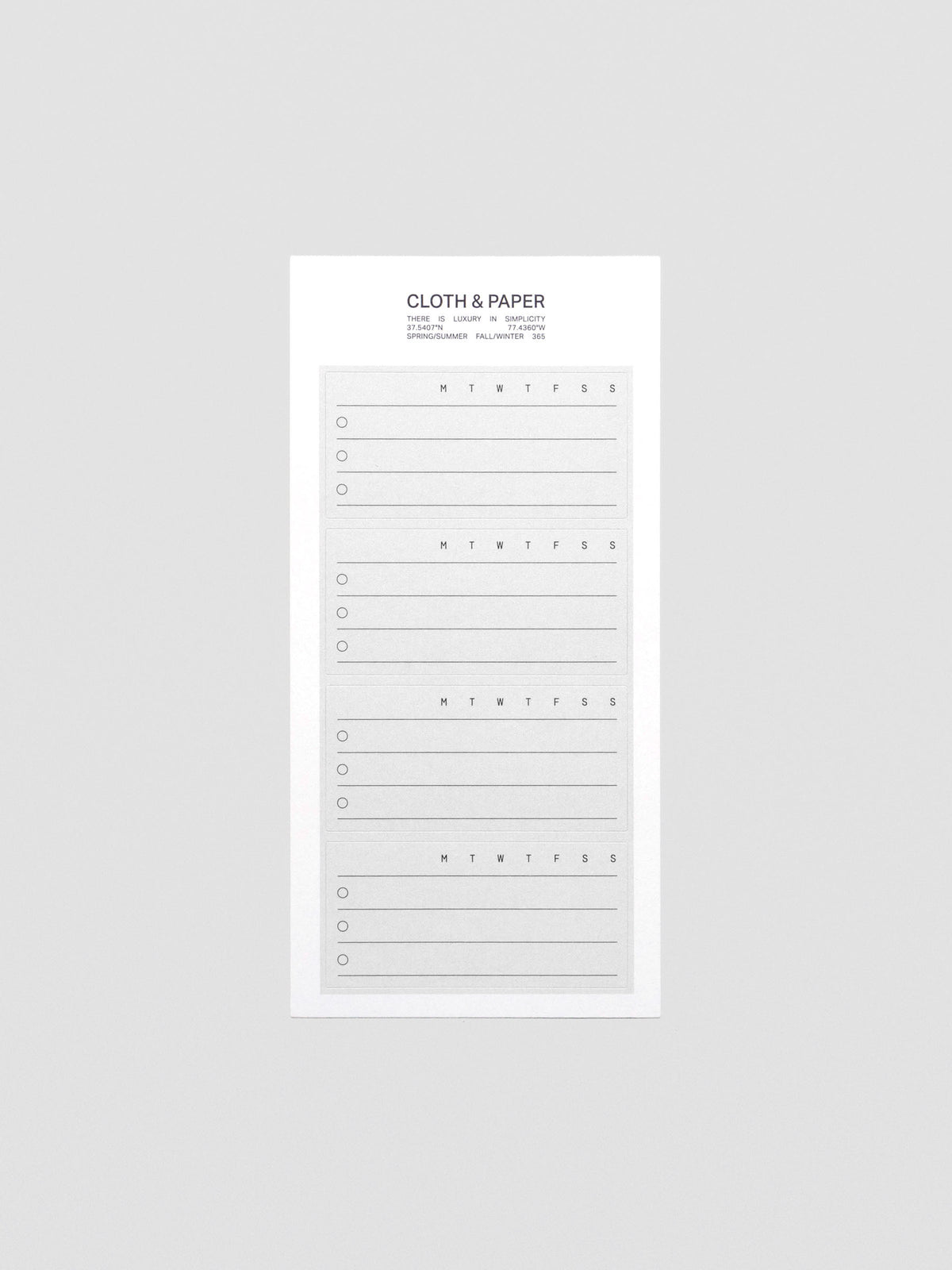 Close-up of black and grey Priority label stickers with bold text.