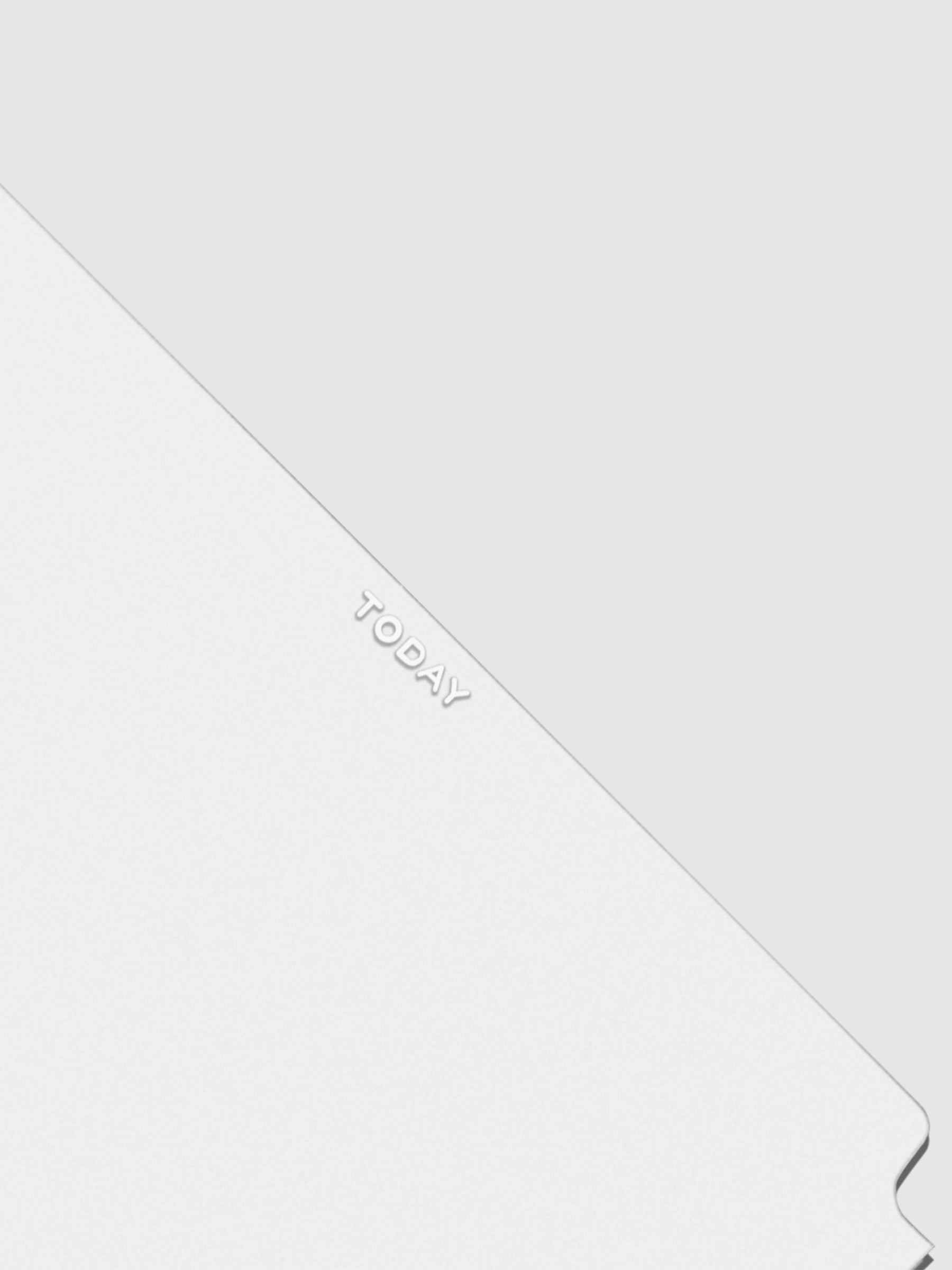 Closeup of white Today foil text.