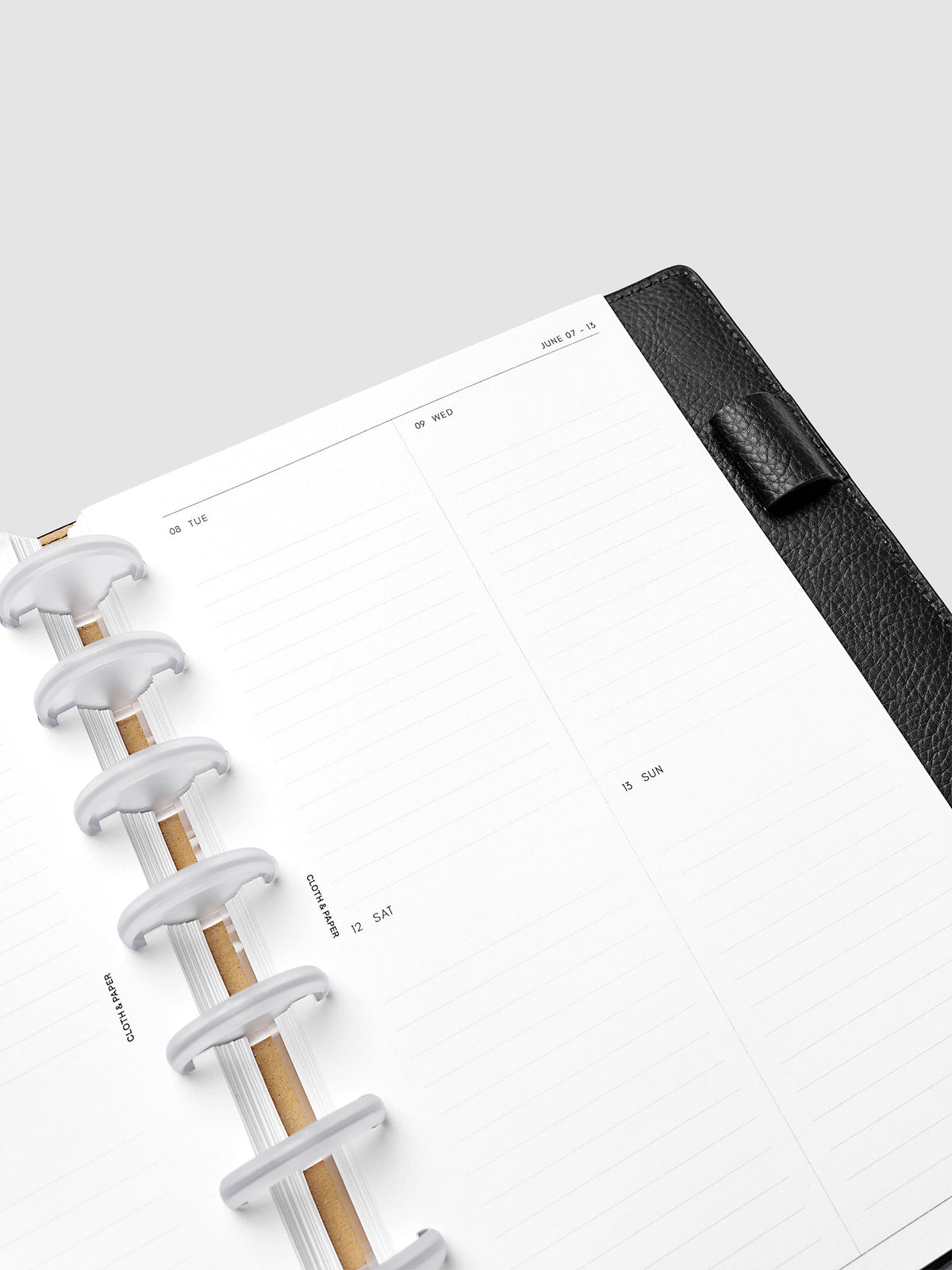 2027 Dated Weekly Vertical Planner Inserts, Monday Start, Half Letter 8-Disc Punch, close-up of the top of the right page showing the upper daily grid sections with lined areas for notes and appointments