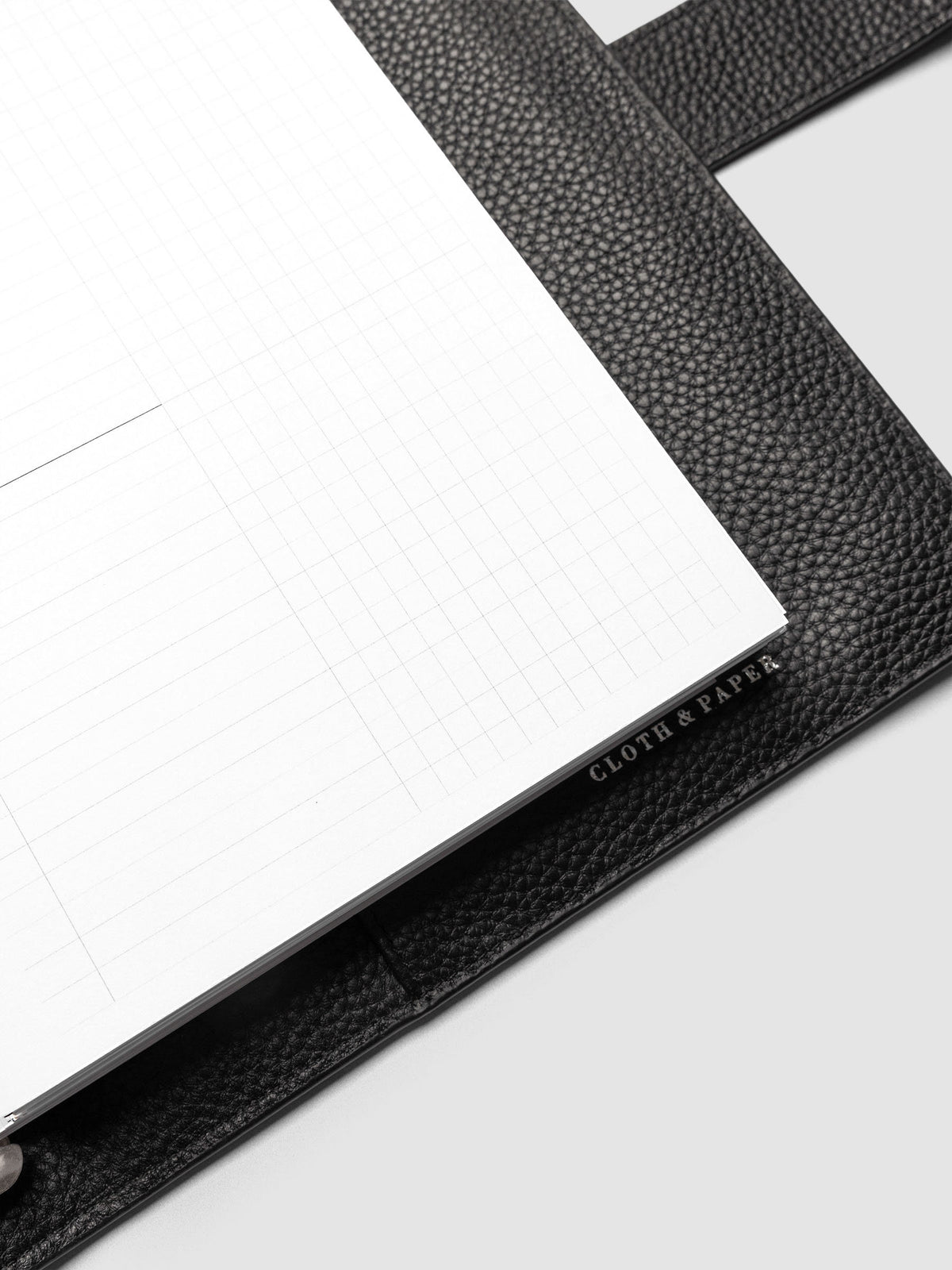 Daily Workflow Planner Inserts, A5 6-Ring Punch, close-up of the bottom of the blank right page showing the graph layout inside a planner