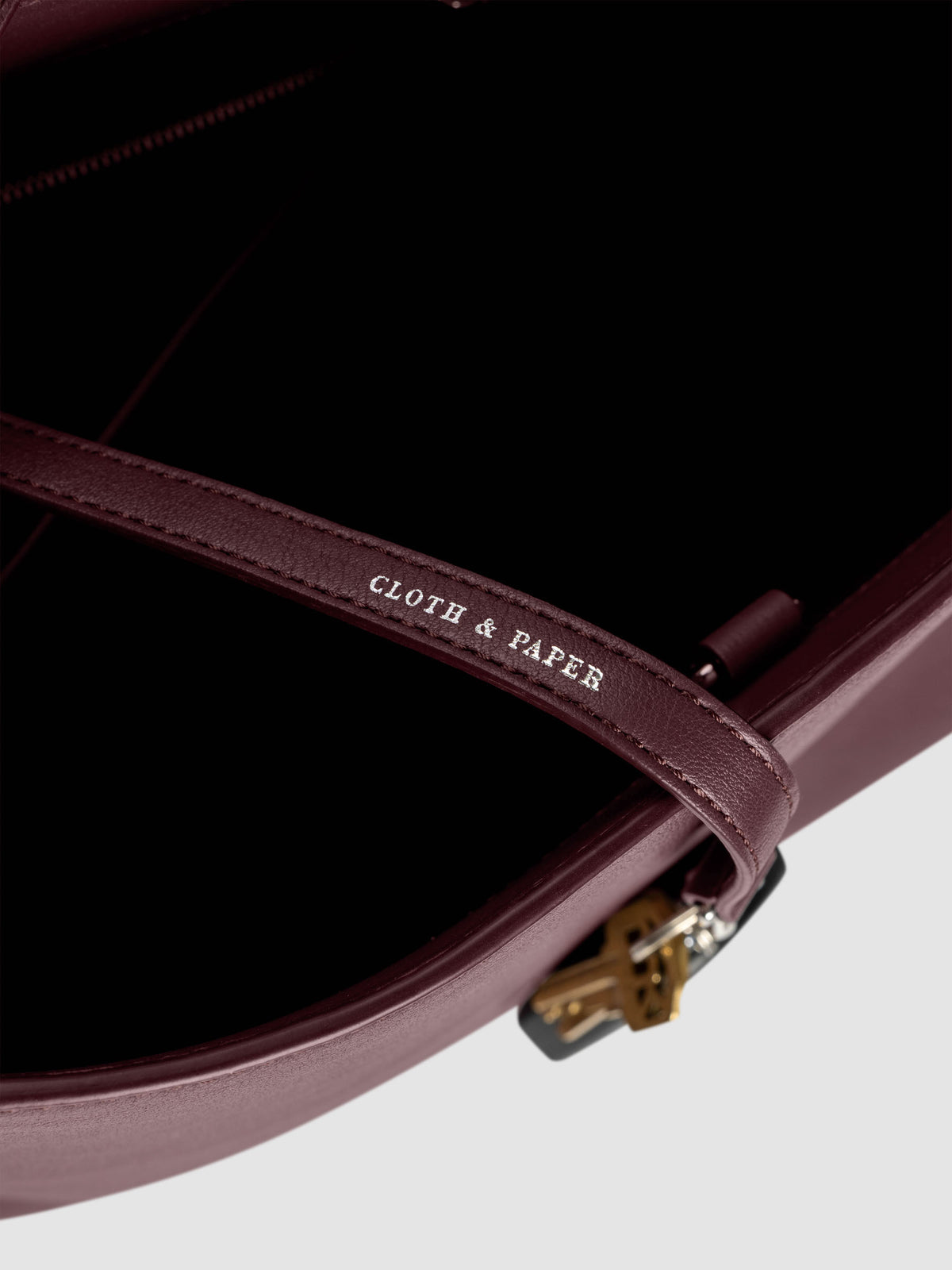Detail view of Cloth & Paper logo foil on The Metro Tote in the color Madrid.