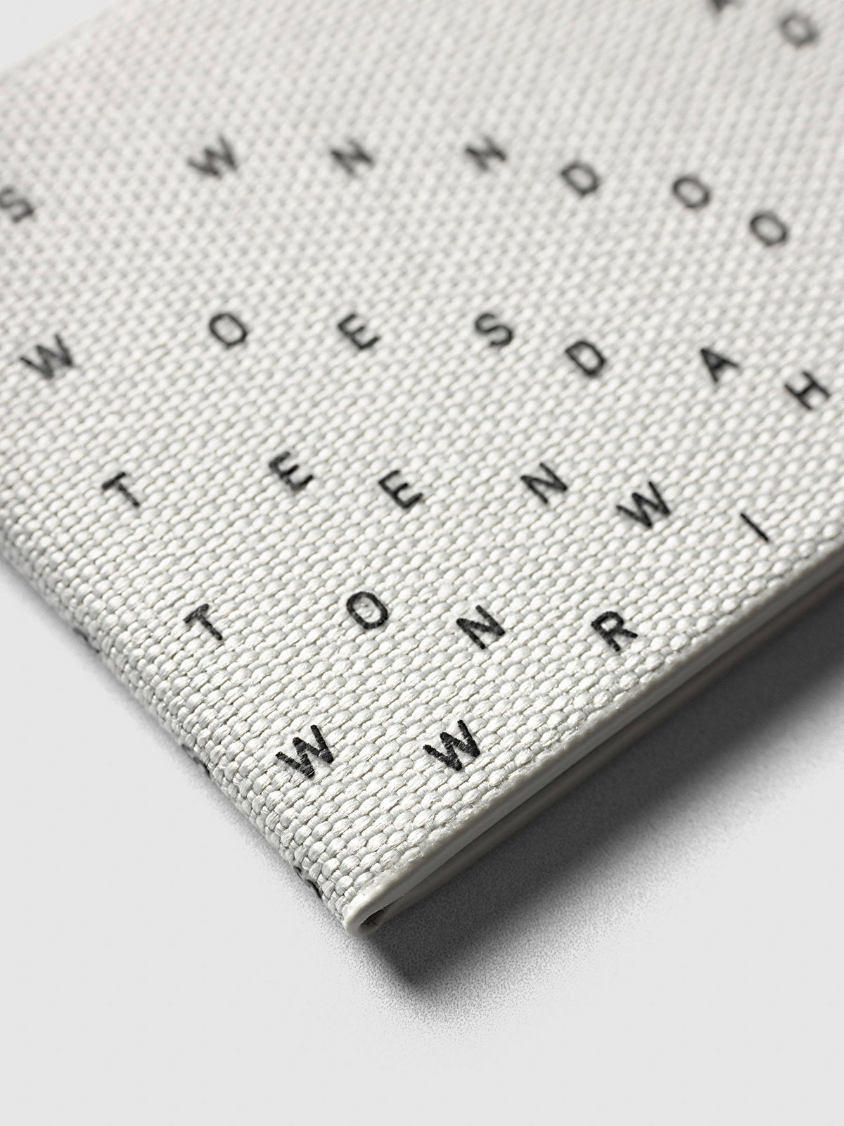 Magnetic Bookmarks Punched Holes & Margin, close-up of the scattered letters on the Margin bookmark