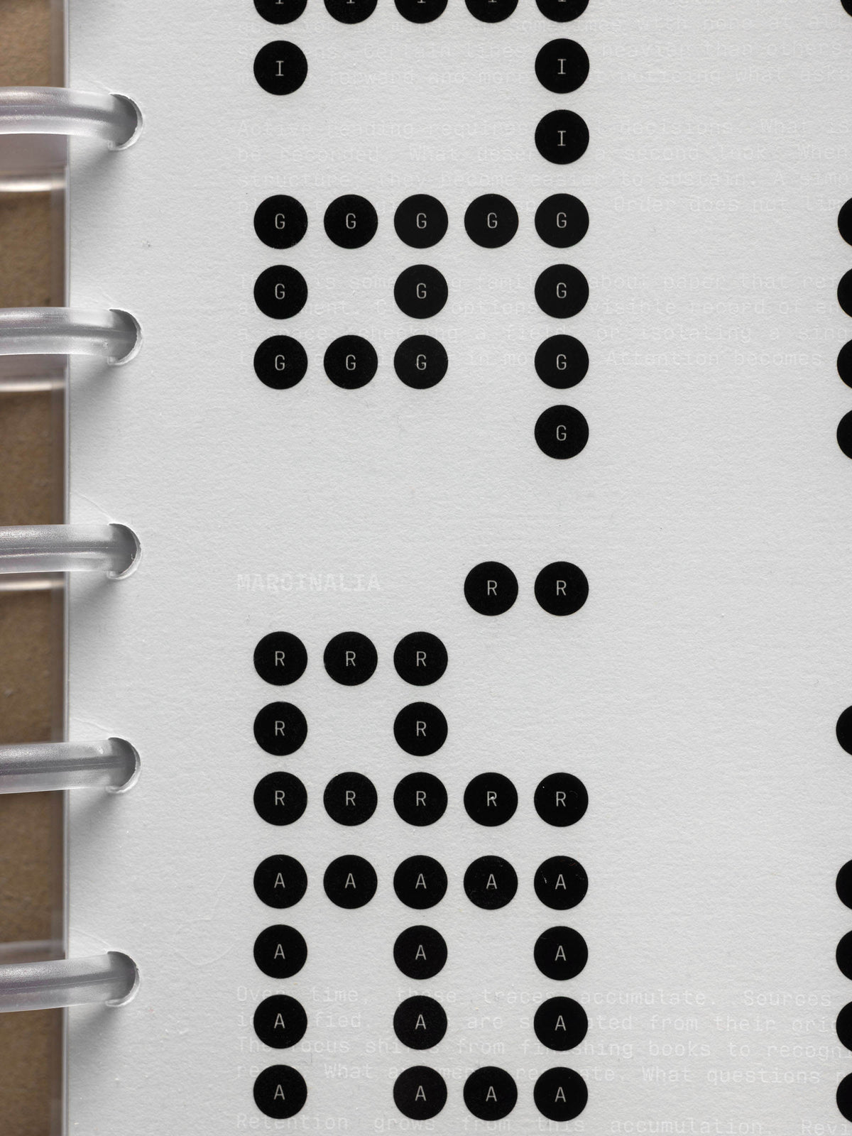 Scantron Dashboard Duo, Half Letter 8-Disc Punch, close-up of the bubble columns running down beside the frosted discs