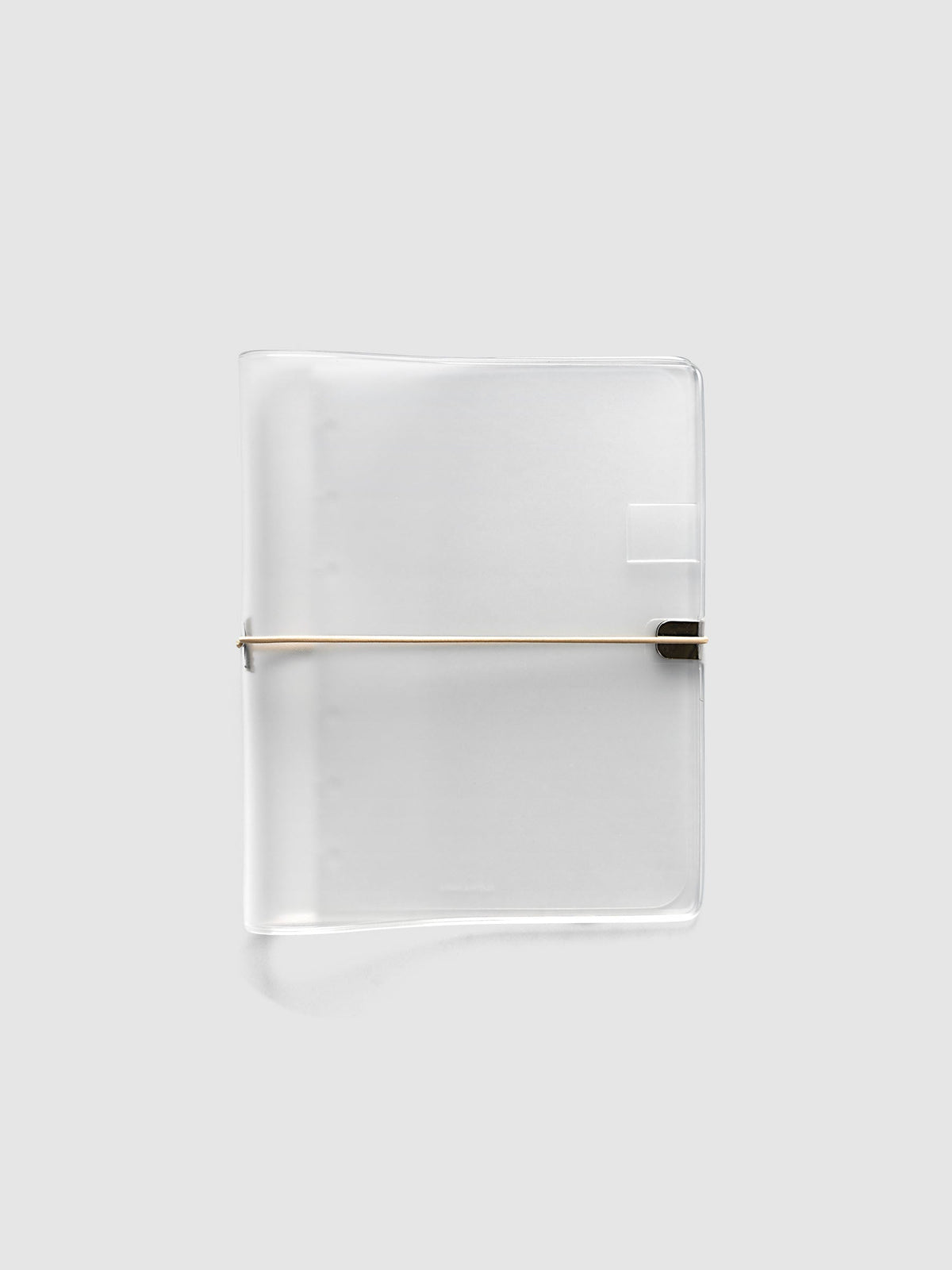 Folio Cover in frosted vinyl, Small (HP Mini 7-Disc Punch), closed with a beige bungee cord hooked to a silver metal clip