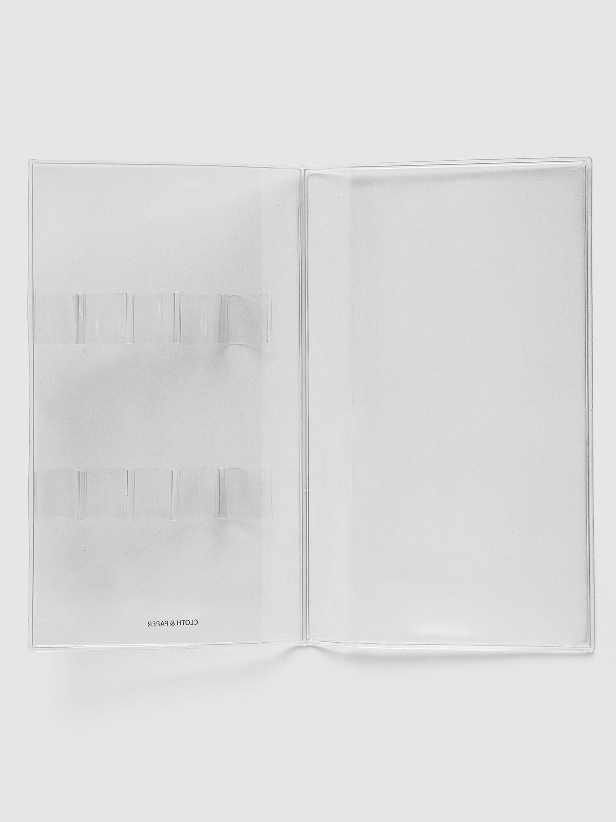 Travel Tool Kit, A5 Slim, open flat showing two rows of pen loops on one side and a full-height clear pocket on the other
