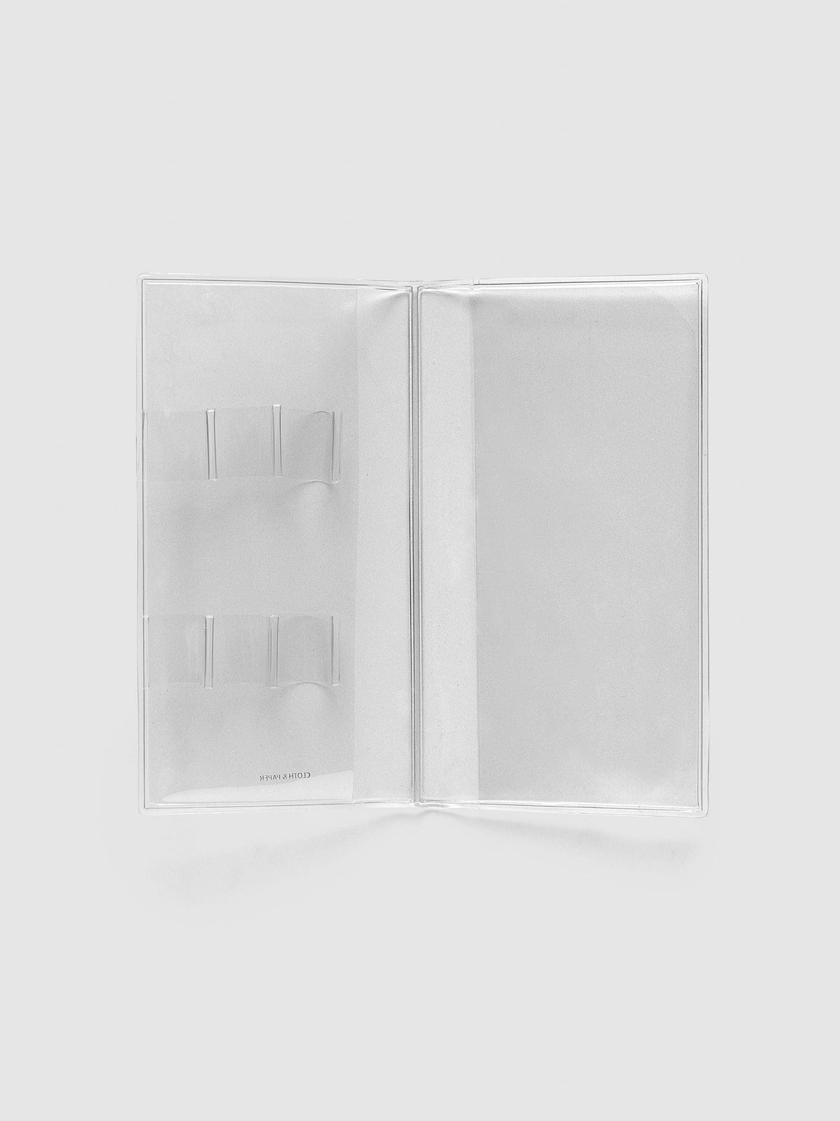 Travel Tool Kit, Pocket Plus, open flat showing pen loops on one side and a full-height clear pocket on the other