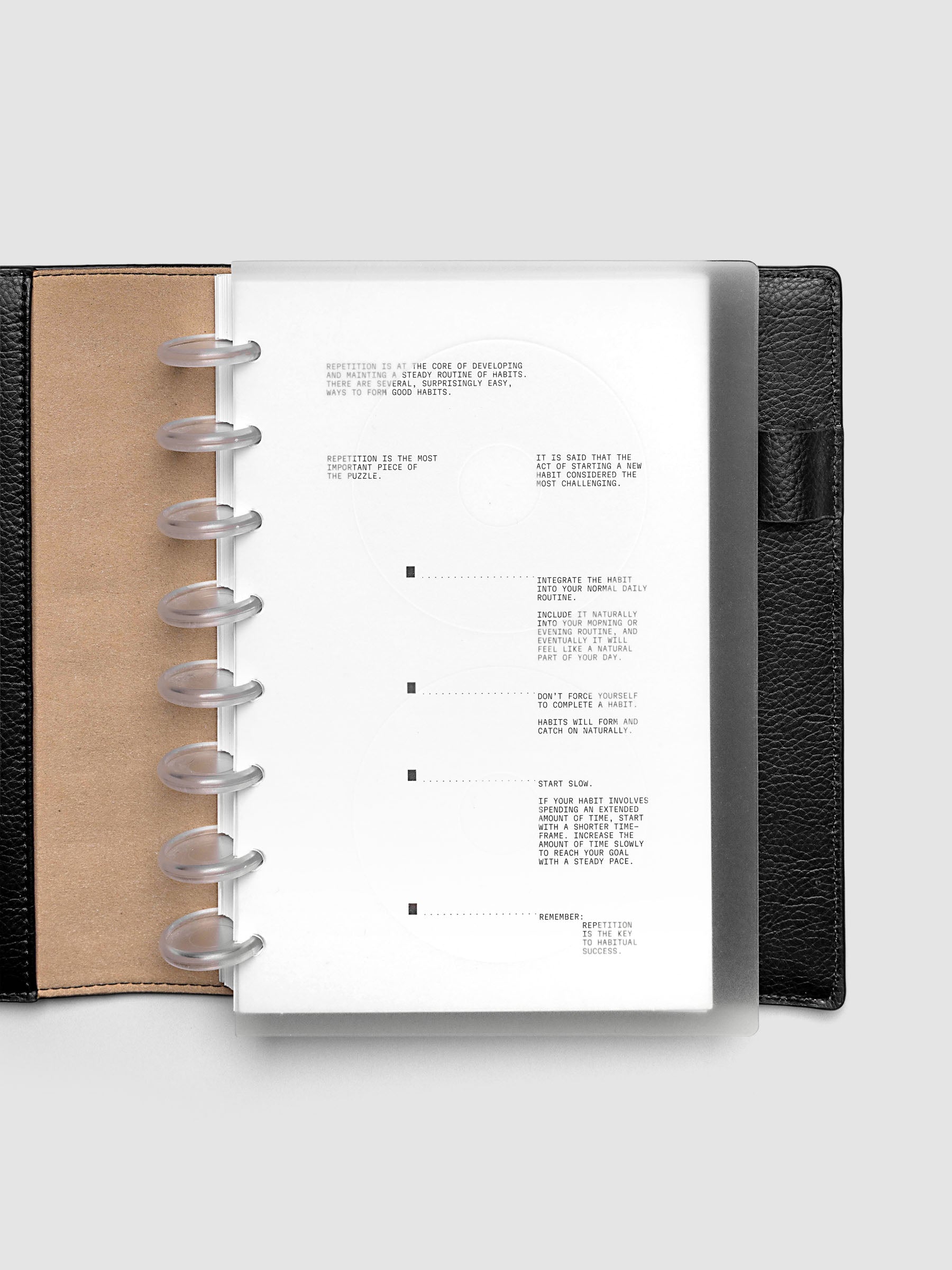 On Repeat Planner Cover + Dashboard Set  shown in a black, Half Letter folio.