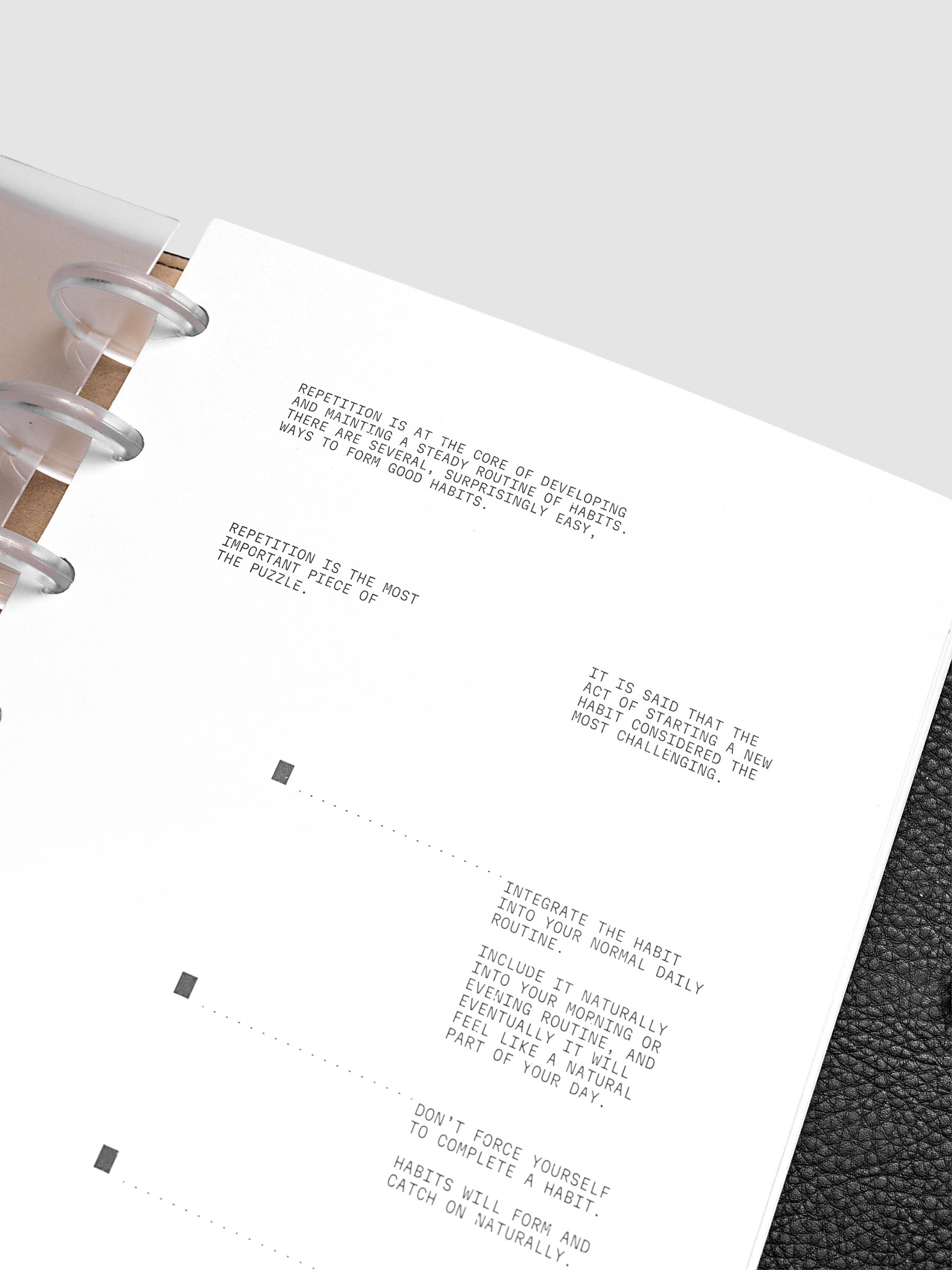 Close up view of a white paper dashboard with black printed text design.