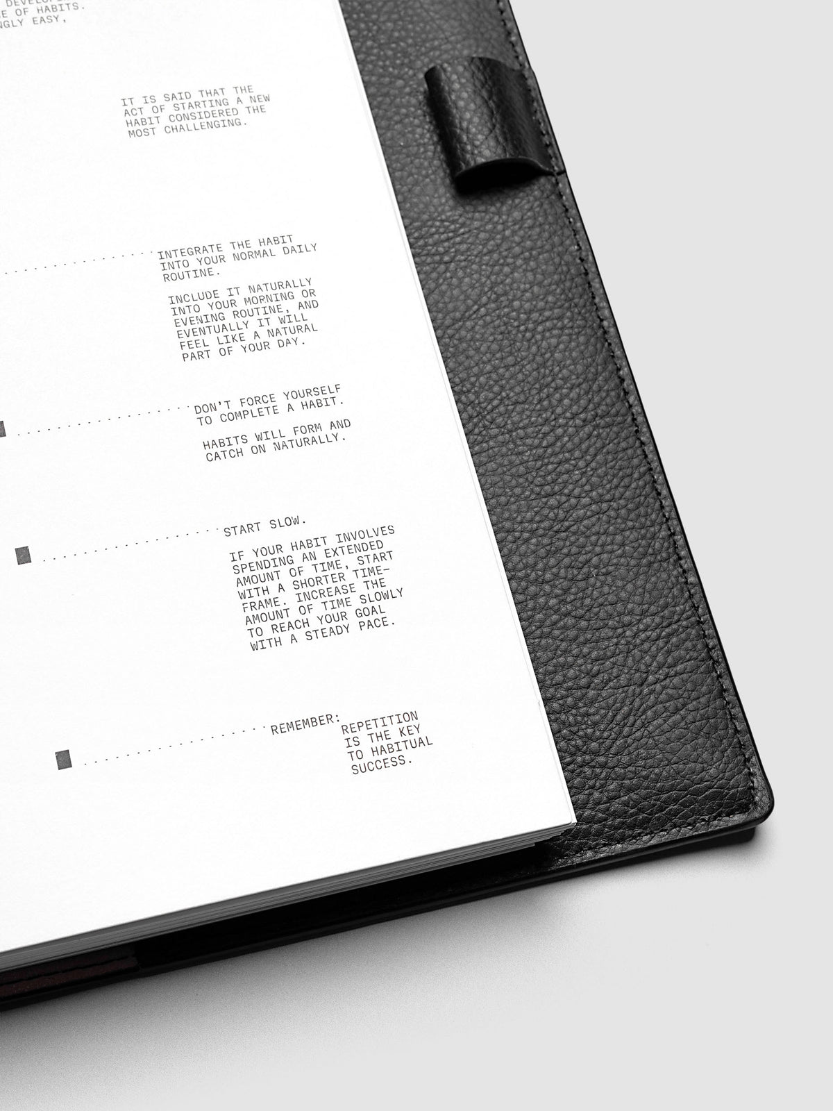 Close up view of a white paper dashboard with black printed text design.