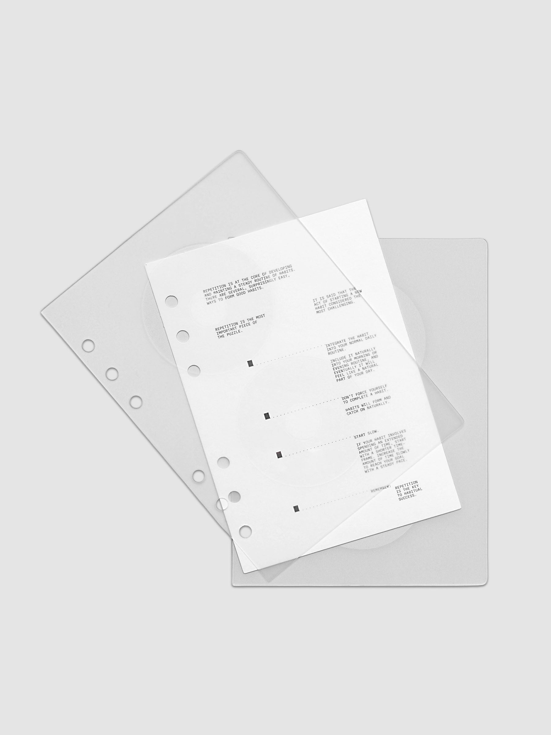 On Repeat Planner Cover + Dashboard Set  shown fanned out in size Personal Wide, pre-punched for 6-ring binders.