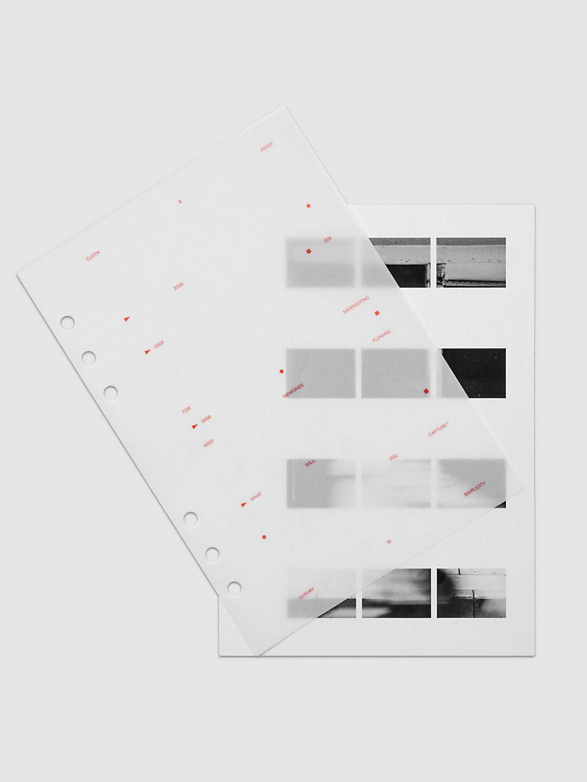Film Strip Planner Dashboard Duo A5 6-Ring Punch two dashboards offset showing layered vellum and film strip plastic with deep orange printed details