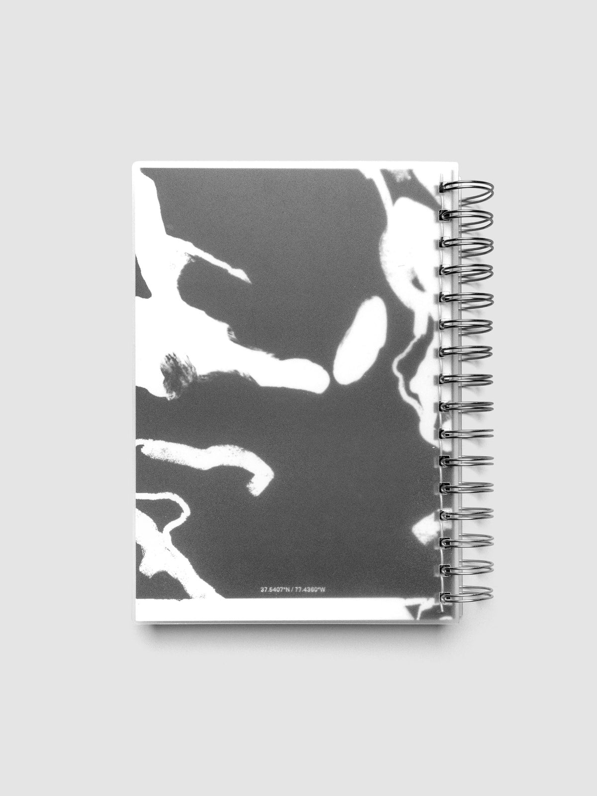 Spiral Notebook dashboard in the pattern Drybrush shown in size A5 inside a notebook with the frosted transparent cover overlayed.