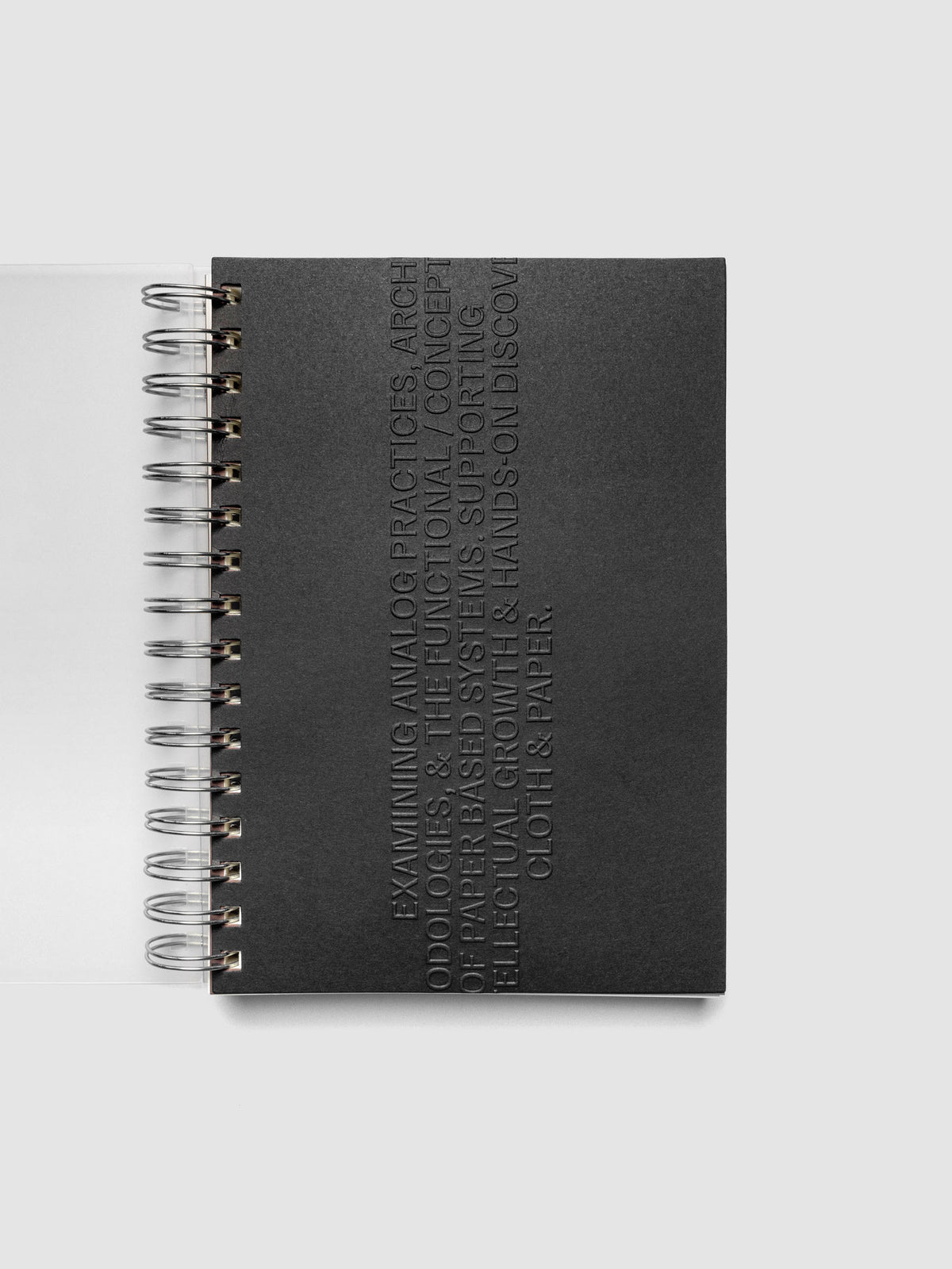 Black embossed Analog Embossed Planner Dashboard without the drop card shown in size A5 Spiral.