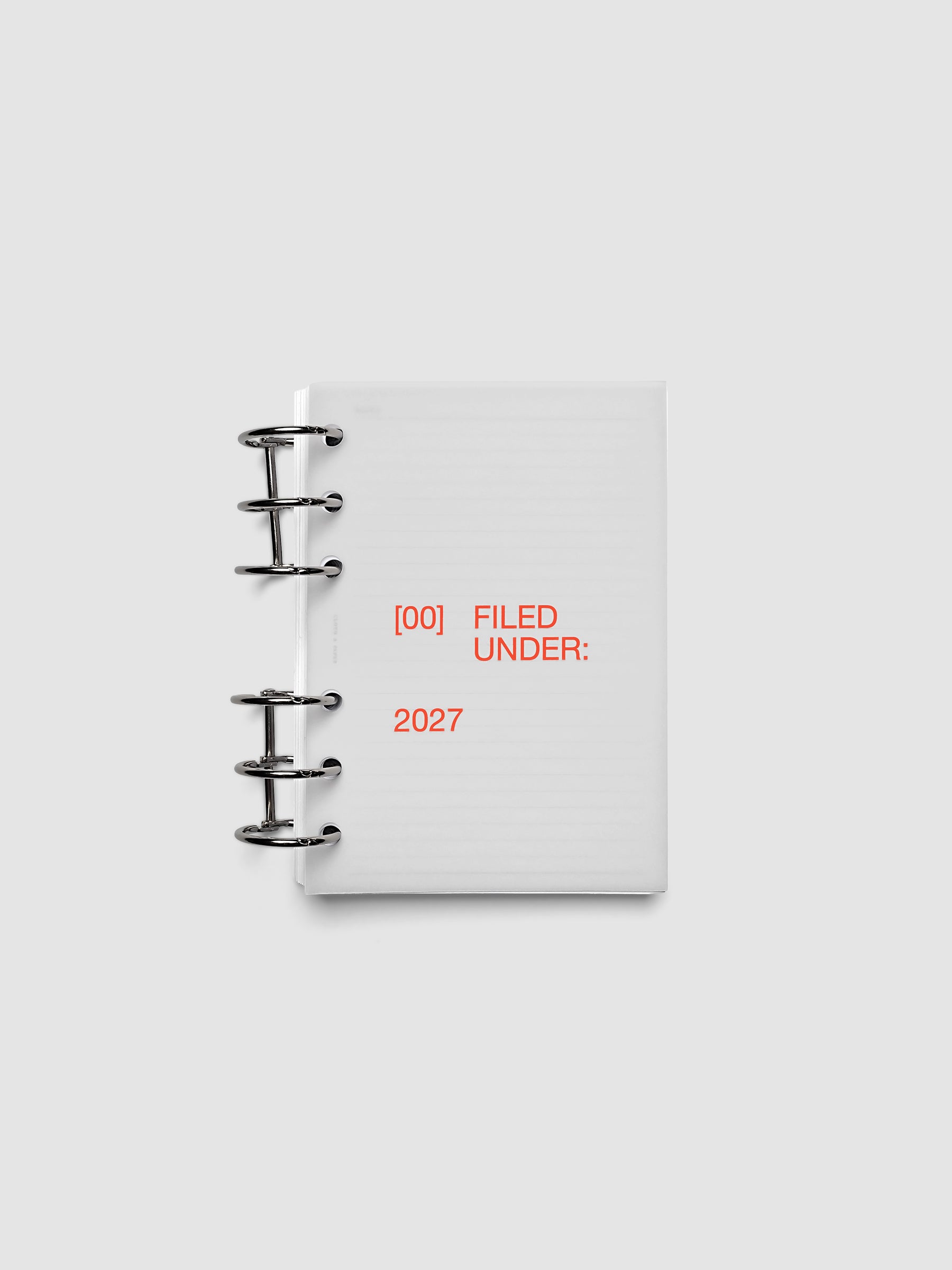 2027 Front + Monthly Dashboard Overlays, Saffron, A6 6-Ring Punch, vellum dashboard overlay shown layered inside a planner