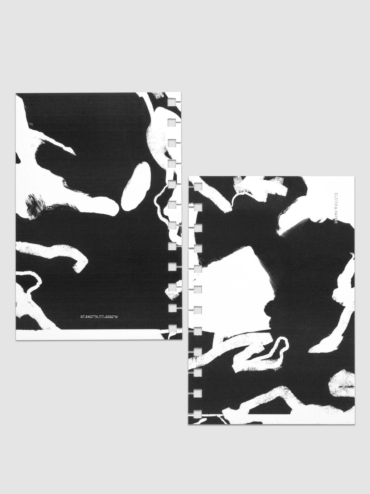 Front and back Spiral Notebook dashboards in the pattern Drybrush shown in size CP Petite against a neutral background.