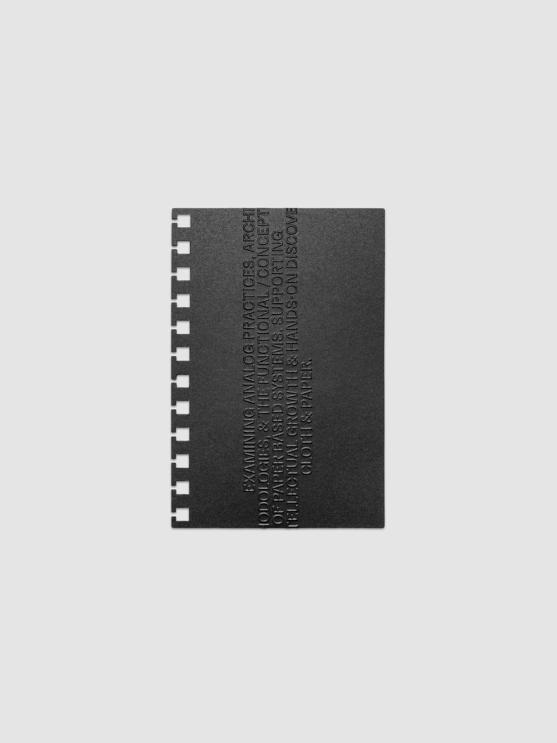 Black embossed Analog Embossed Planner Dashboard without the drop card shown in size CP Petite Spiral.