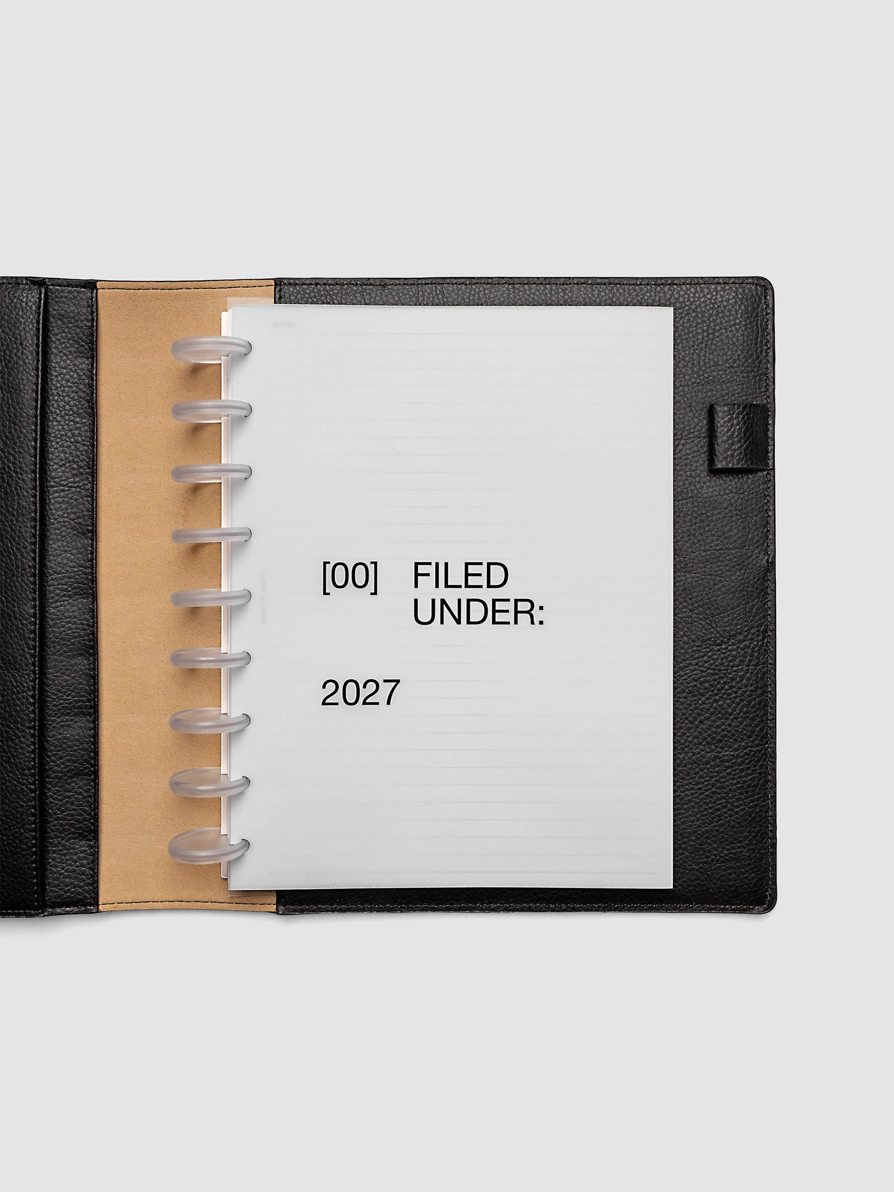 2027 Front + Monthly Dashboard Overlays, Avant Garde, HP Classic 9-Disc Punch, vellum dashboard overlay shown layered inside a planner