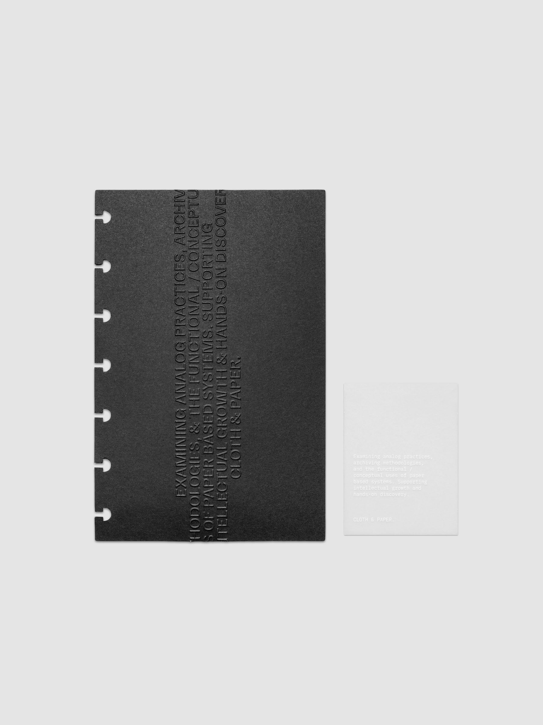 Black embossed Analog Embossed Planner Dashboard with drop card shown in size HP Mini.
