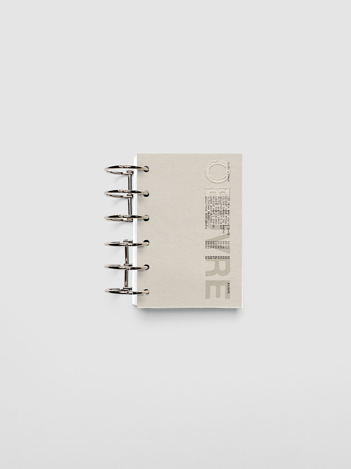 Oeuvre Planner Dashboard in Pocket 6-Ring Punch size shown in a planner