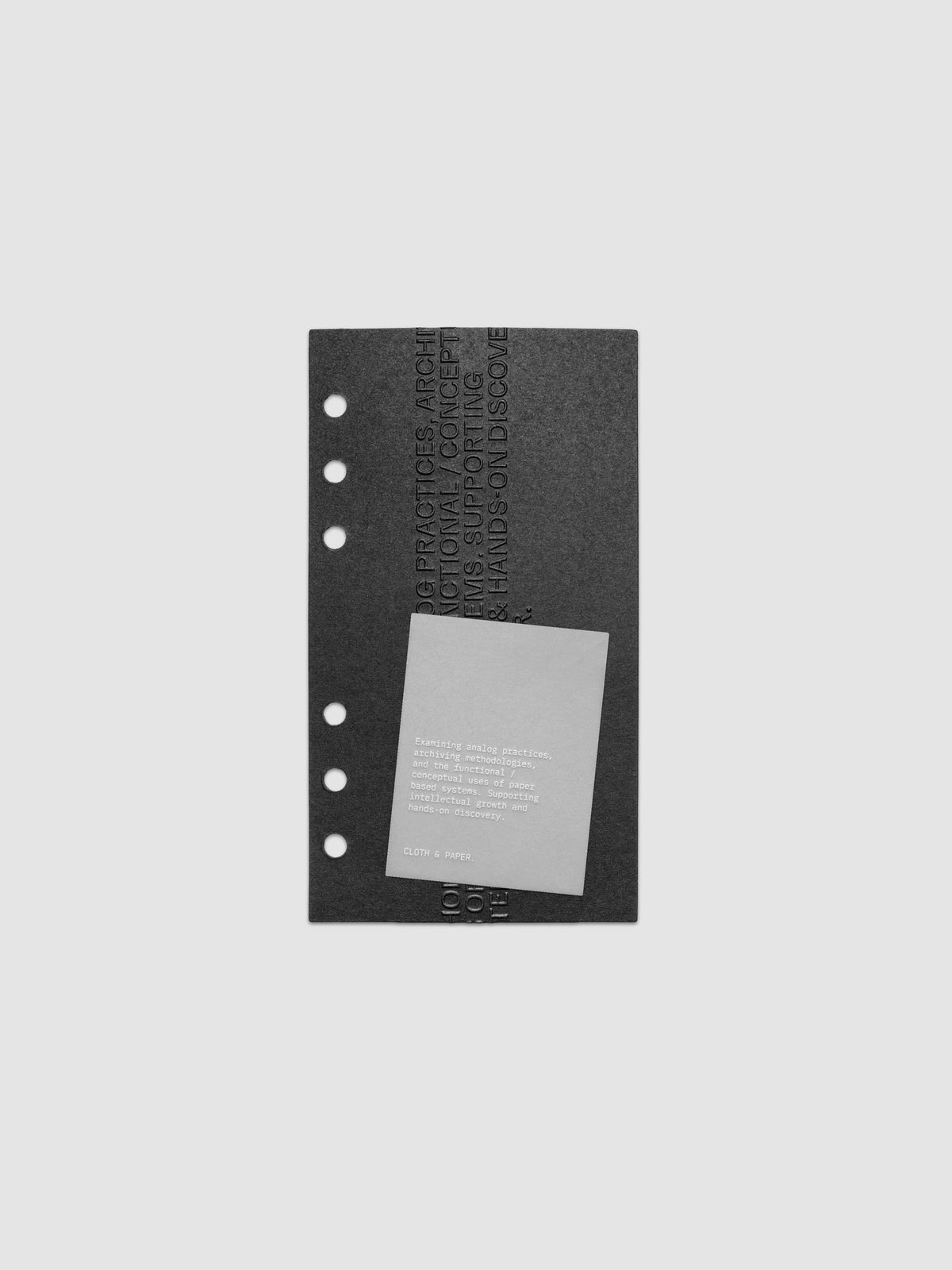 Black embossed Analog Embossed Planner Dashboard with drop card shown in size Personal.