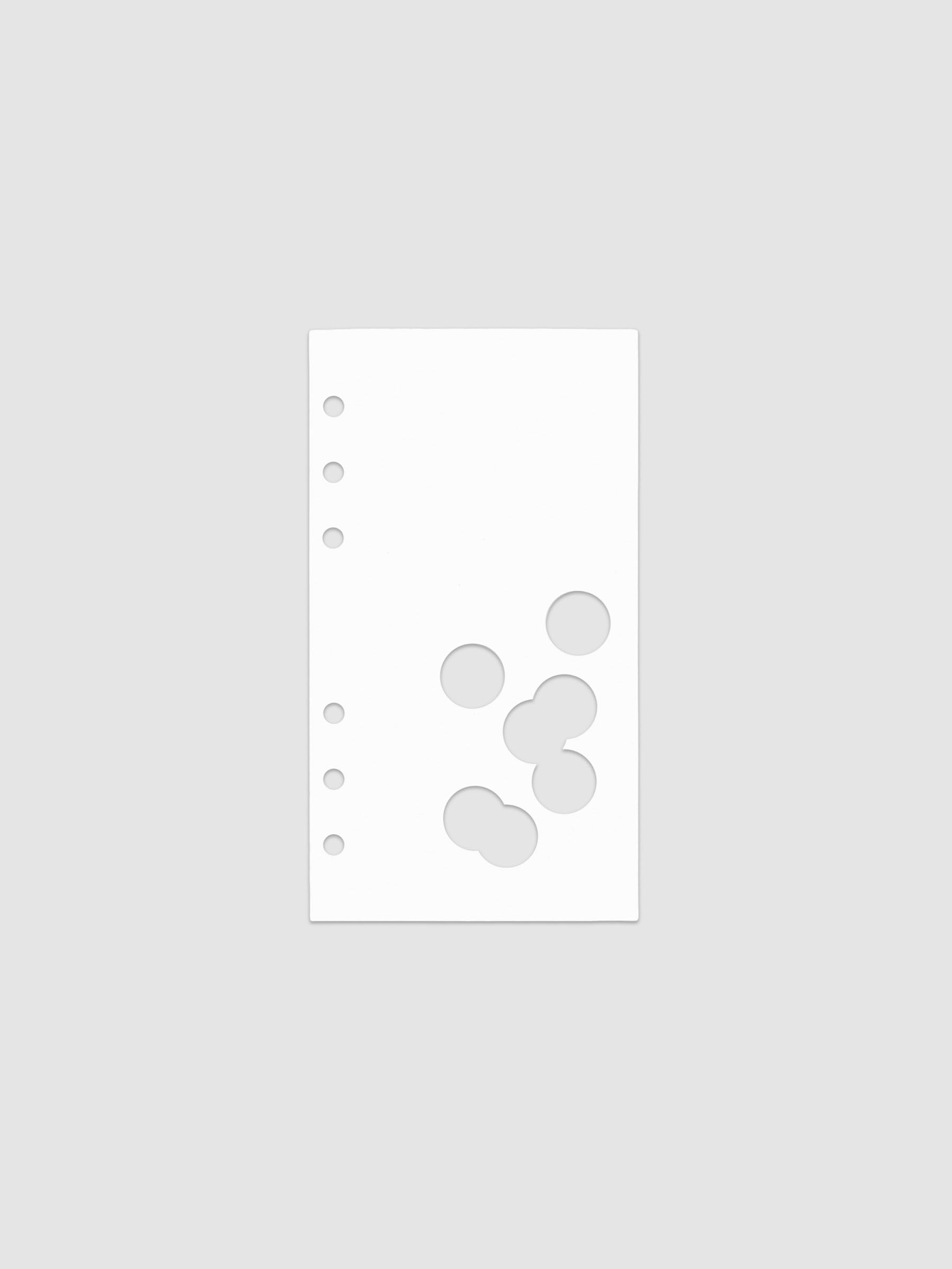 White dashboard from the Ink Blot Planner Dashboard Duo on a neutral background in size Personal, pre-punched for 6-ring planners.