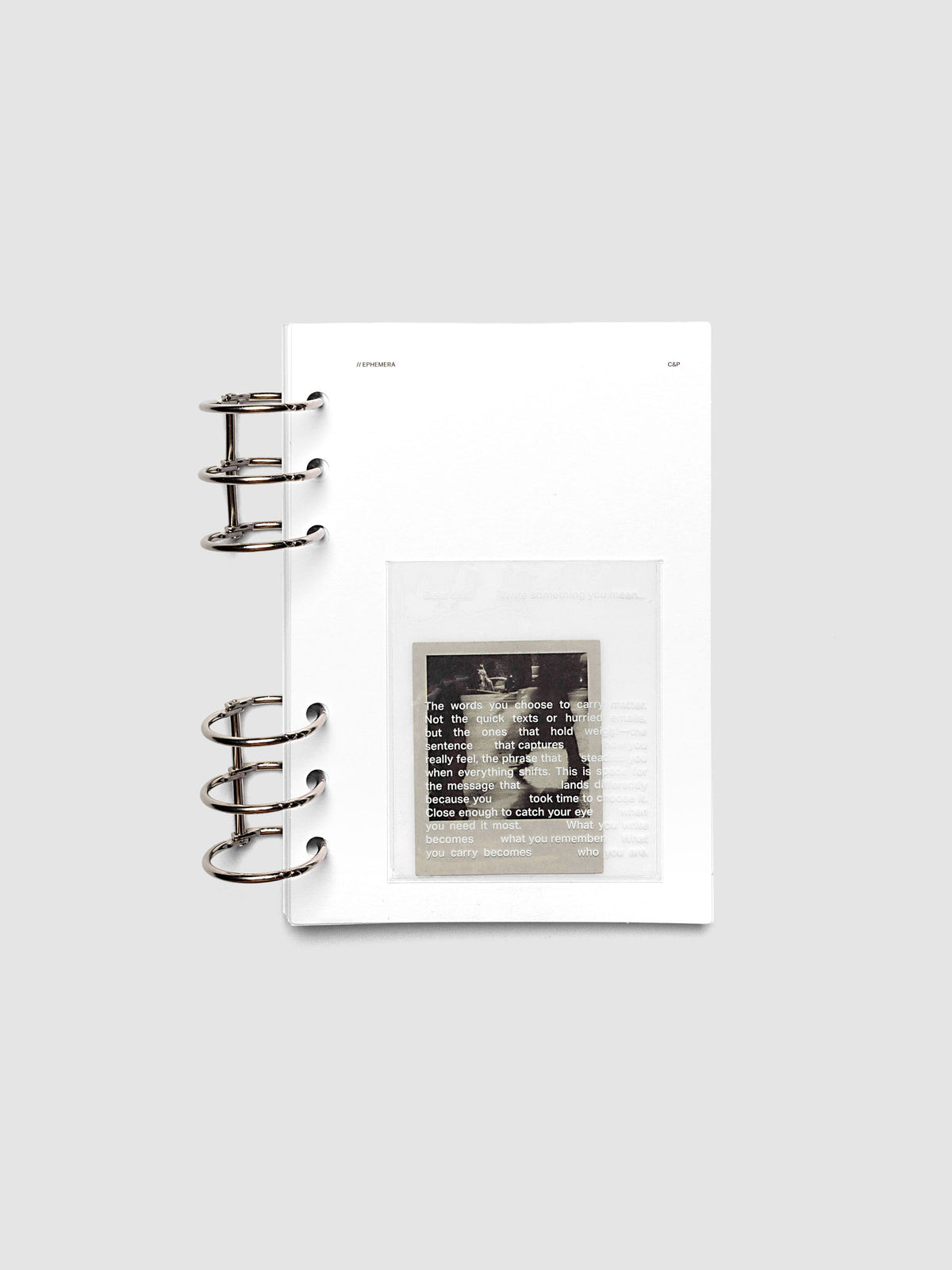 White Ephemera Planner Dashboard shown ring bound in size Personal Wide.