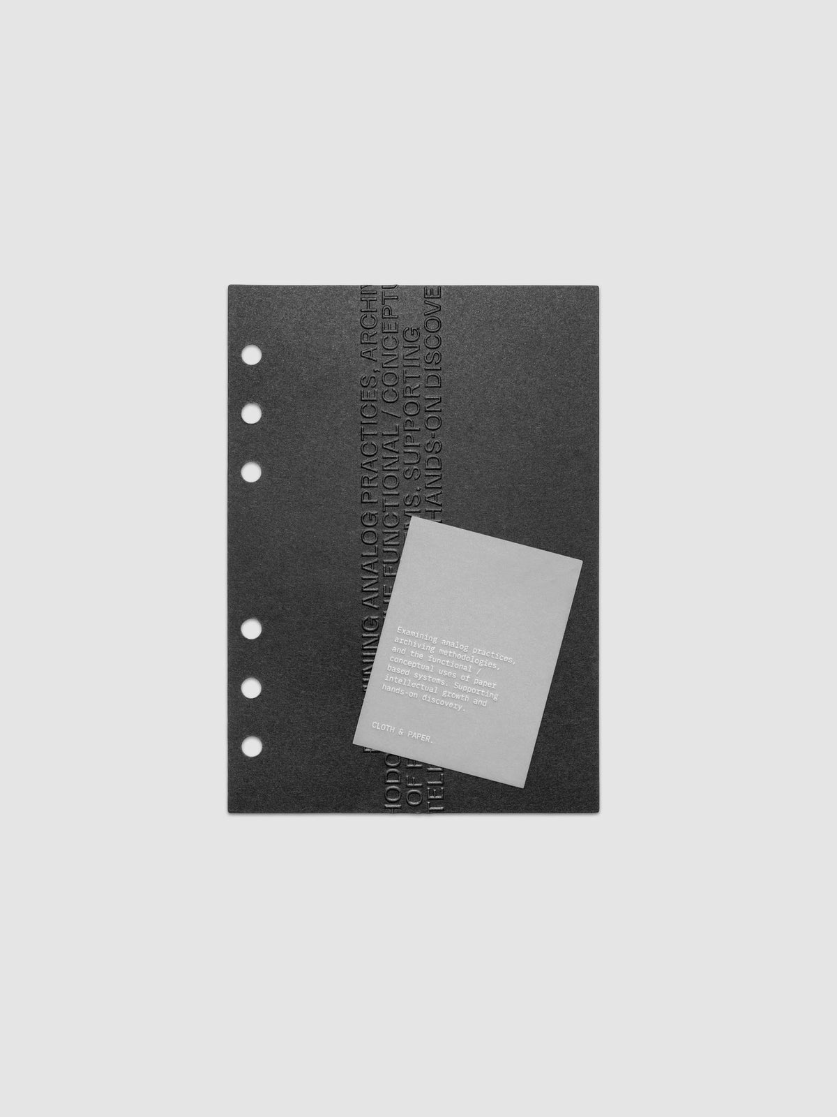 Black embossed Analog Embossed Planner Dashboard with drop card shown in size Personal Wide.
