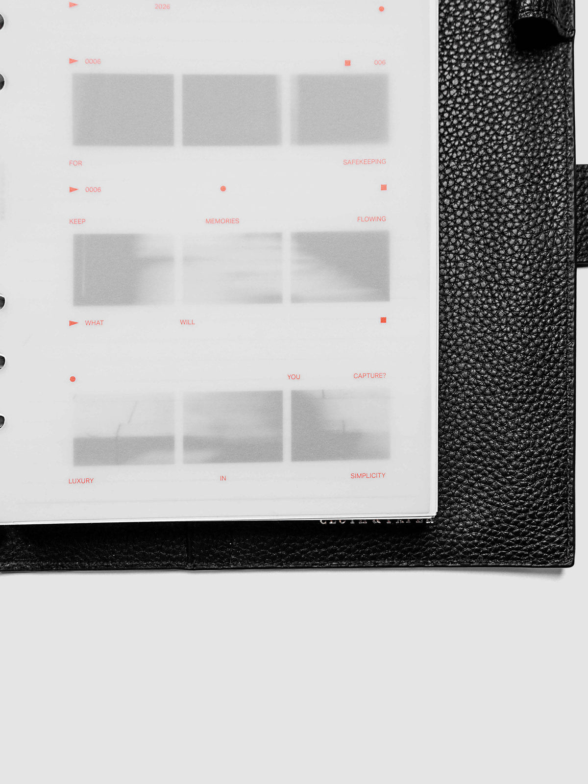 Film Strip Planner Dashboard Duo A5 6-Ring Punch close-up of bottom left corner showing both dashboards stacked inside a planner
