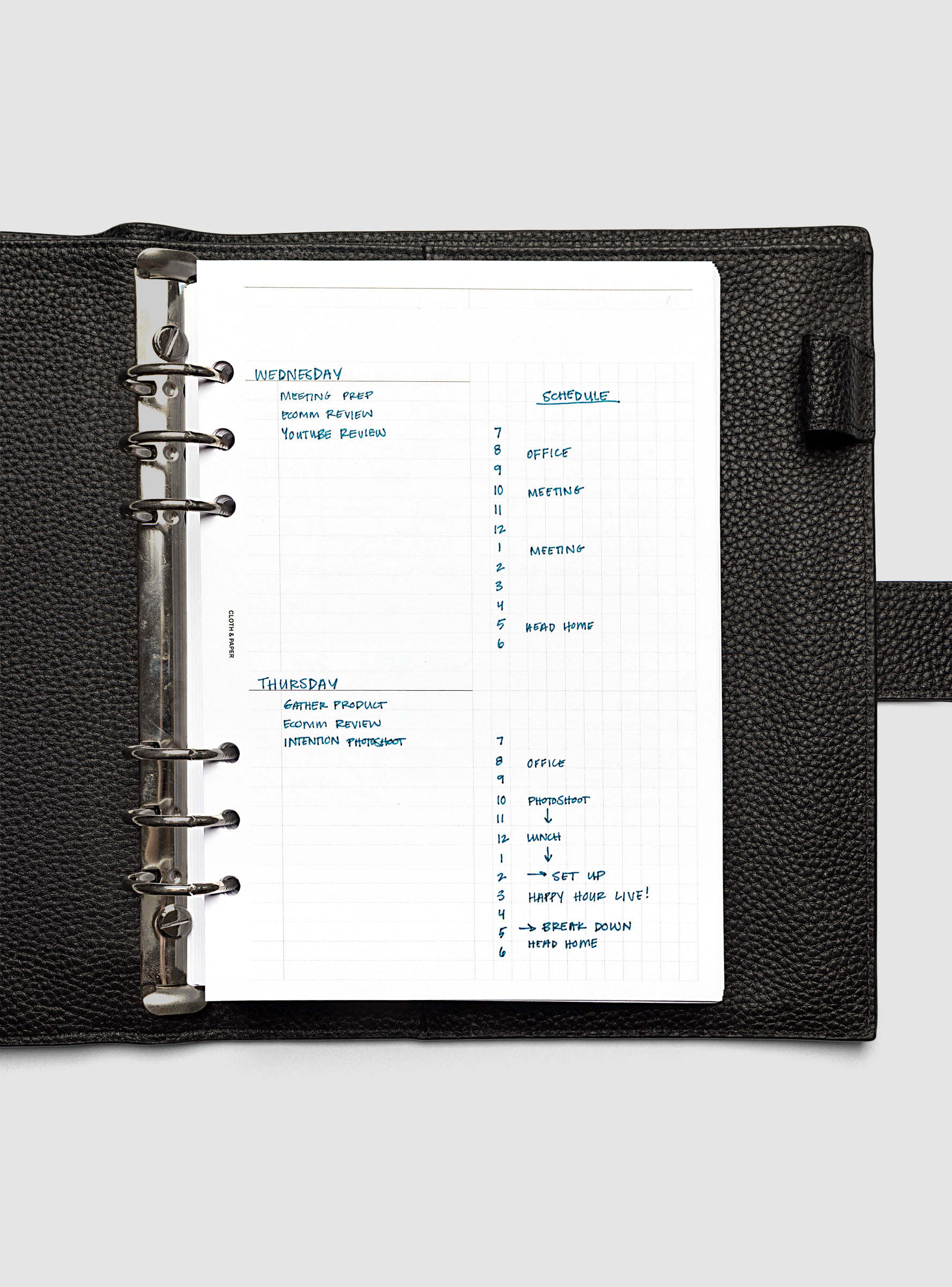 Daily Workflow Planner Inserts, A5 6-Ring Punch, right page with handwritten notes filling the large graph section shown inside a planner