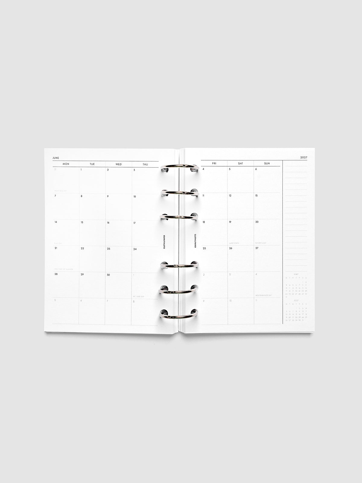 2027 Dated Monthly Planner Inserts, Monday Start, A6 6-Ring Punch, full two-page monthly calendar spread with Monday start, notes column, and mini calendars in the bottom right corner shown inside a planner