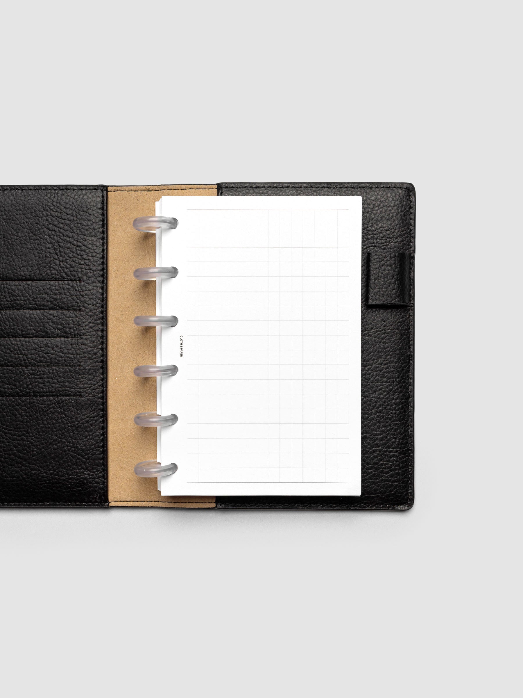 Inbox Sorting Planner Inserts shown pre-punched for discbound CP Petite planners in a black folio.