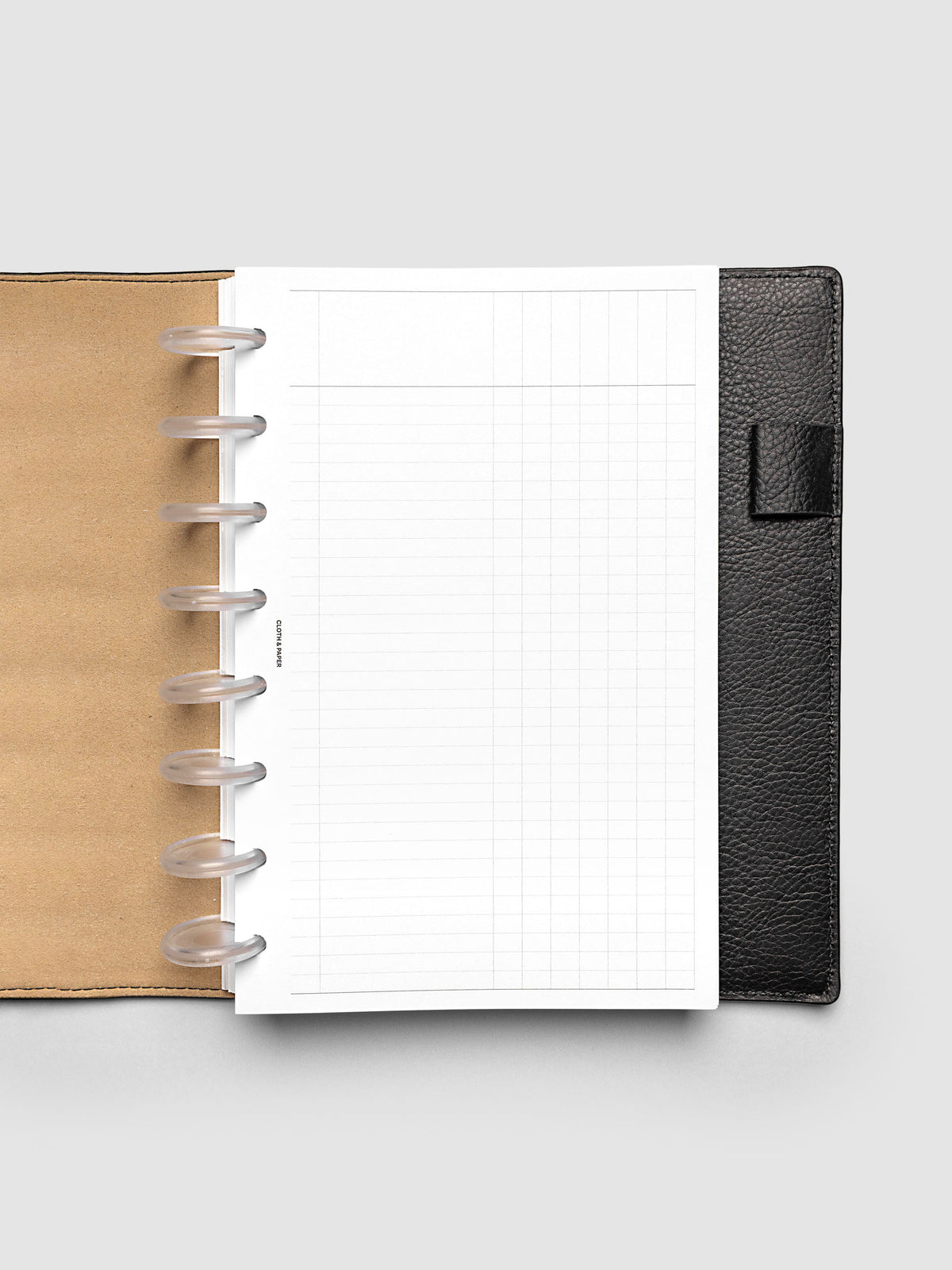 Inbox Sorting Planner Inserts shown pre-punched for discbound Half Letter planners in a black folio.