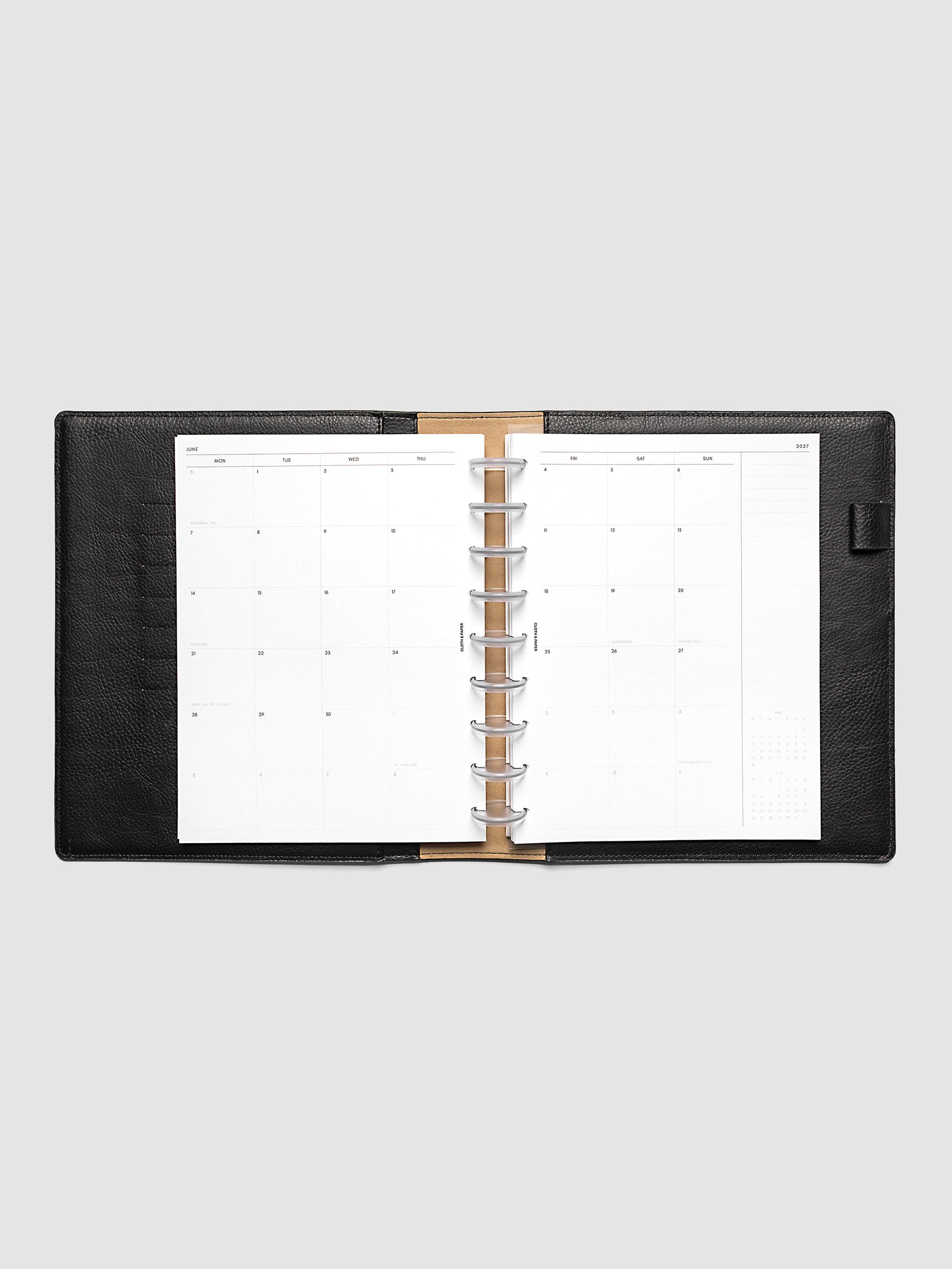2027 Dated Monthly Planner Inserts, Monday Start, HP Classic 9-Disc Punch, full two-page monthly calendar spread with Monday start, notes column, and mini calendars in the bottom right corner shown inside a planner