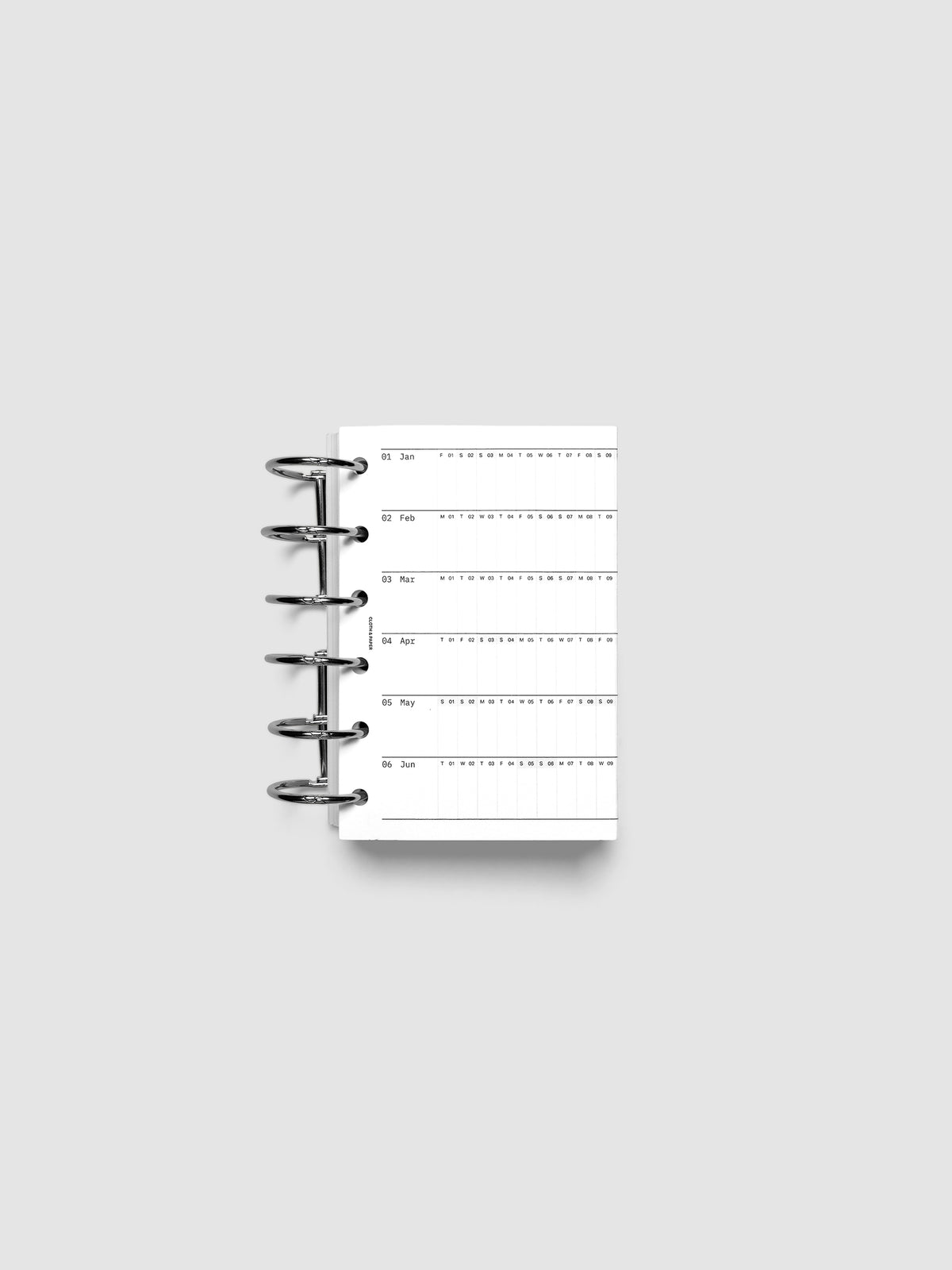 2027 Dated Fold Out Insert tucked into a Pocket 6-Ring Punch 6-ring planner, shown closed.