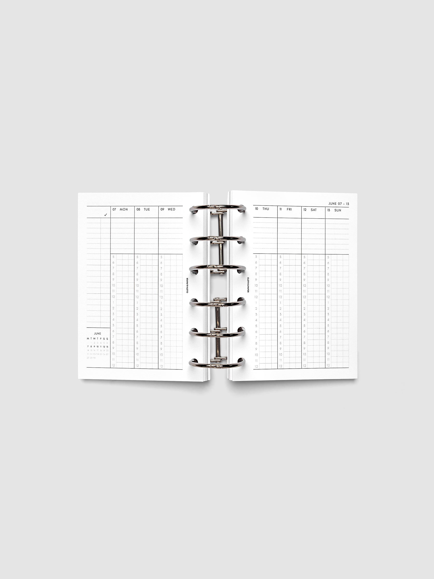 Pocket 6-Ring Punch weekly time block spread showing left and right pages in a planner
