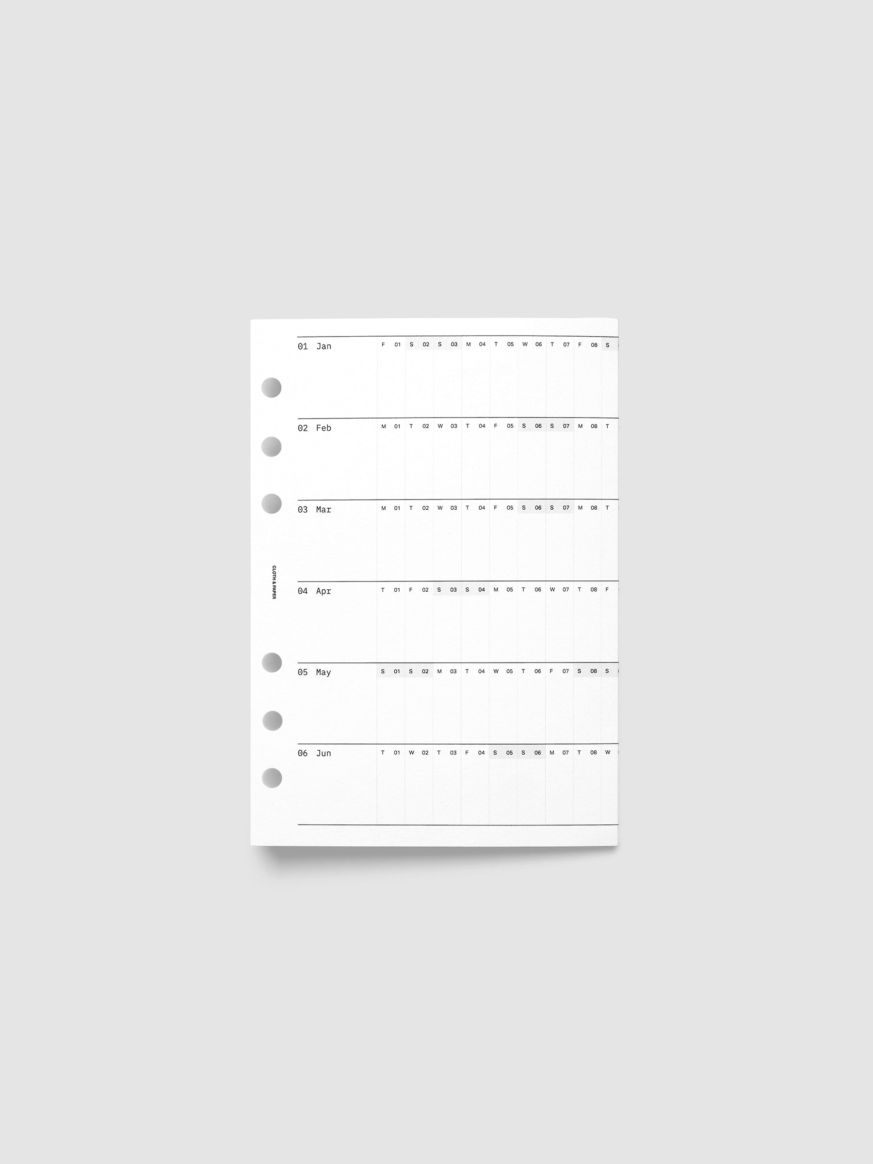 Personal Wide 6-Ring Punch 2027 Dated Fold Out Insert shown folded closed, displaying the cover side on a flat surface.