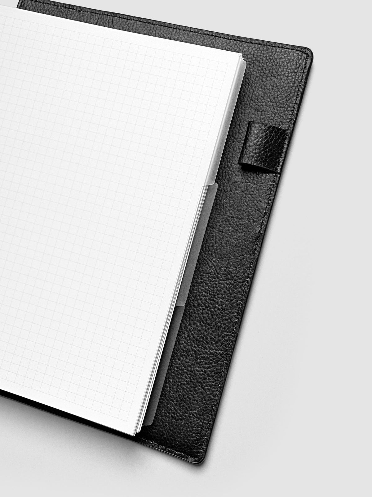 Blank, transparent side tab divider set shown in a HP Classic planner.