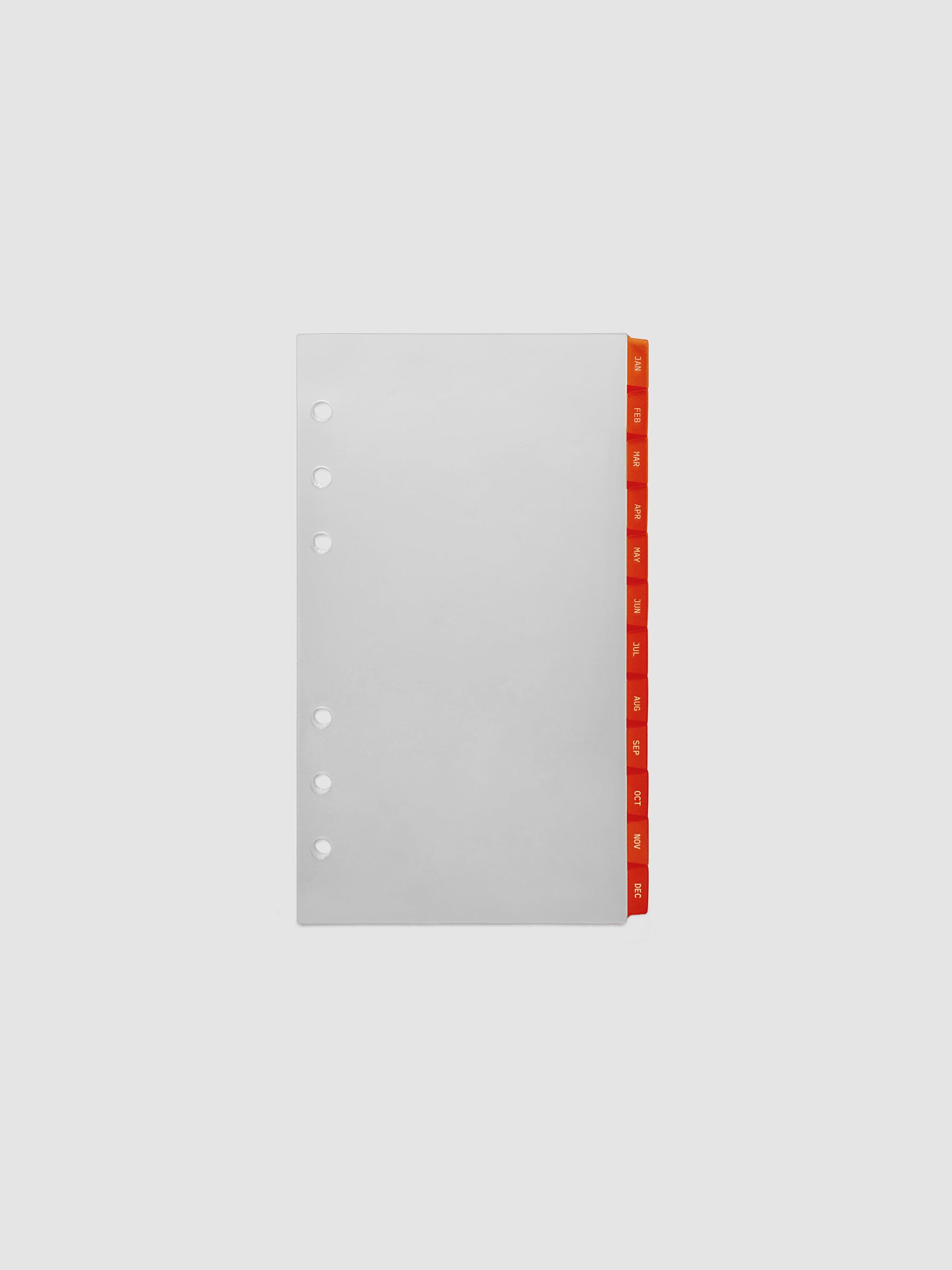 Personal 6-Ring Punch Ultra-Thin Monthly Dividers in deep orange, set of 12 dividers fanned to show all months