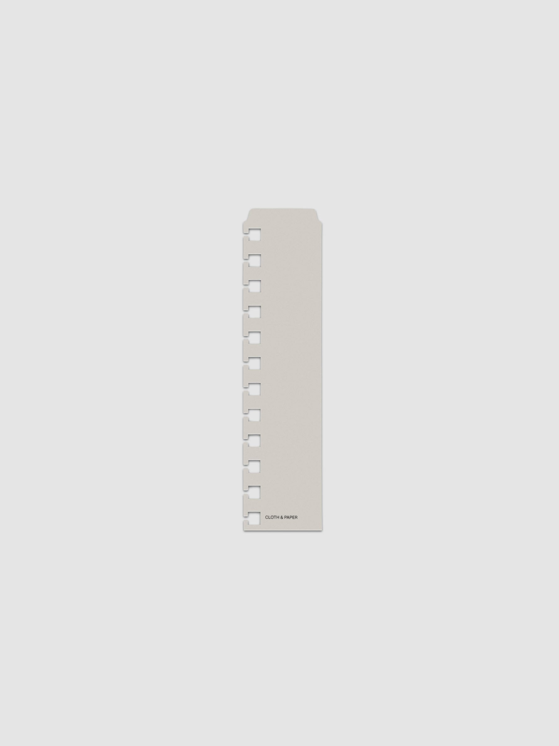 One narrow page marker in grey, shown in size CP Petite Spiral.