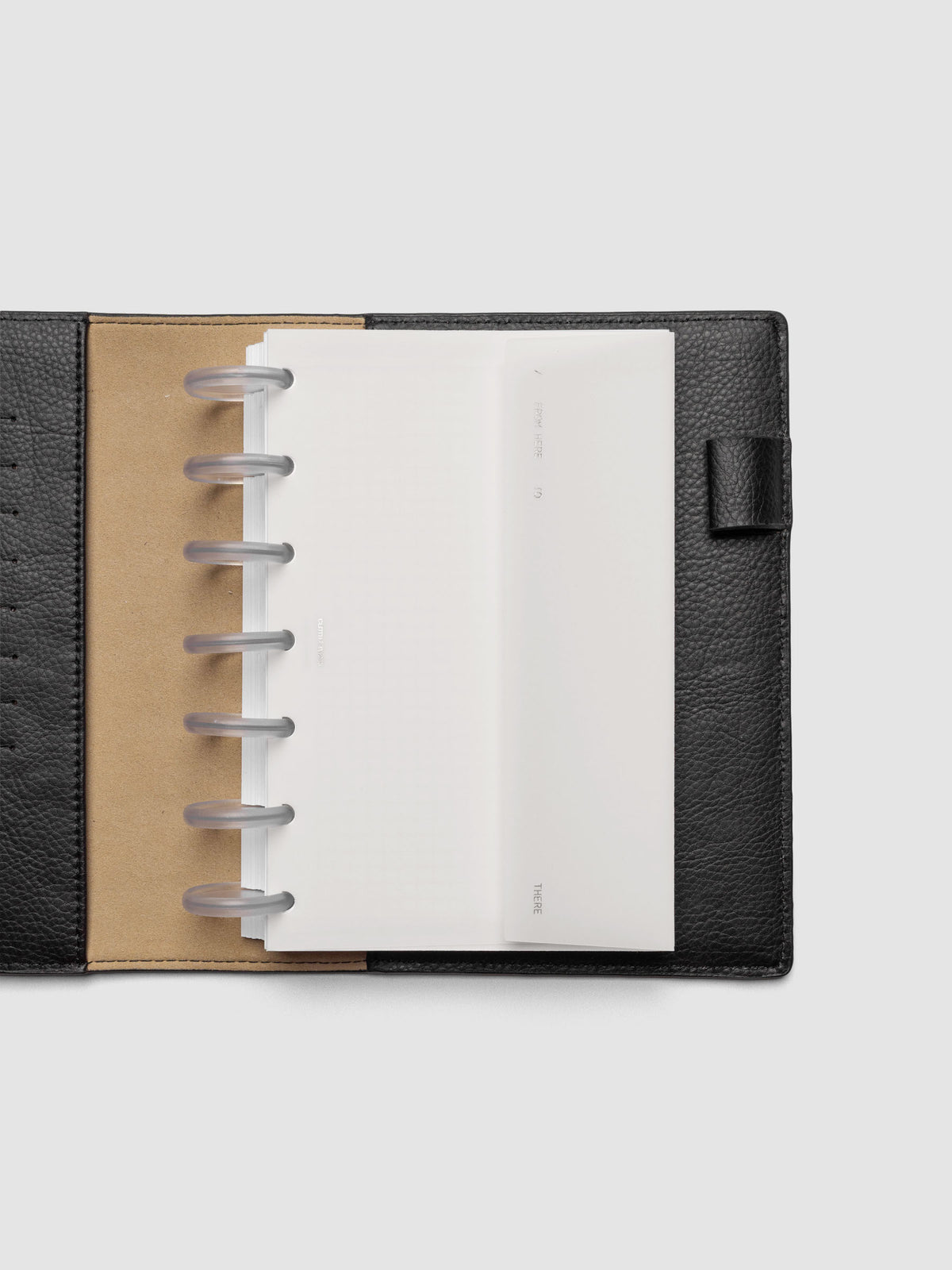 White Envelope Storage Holder shown inside a black, leather HP Mini folio.