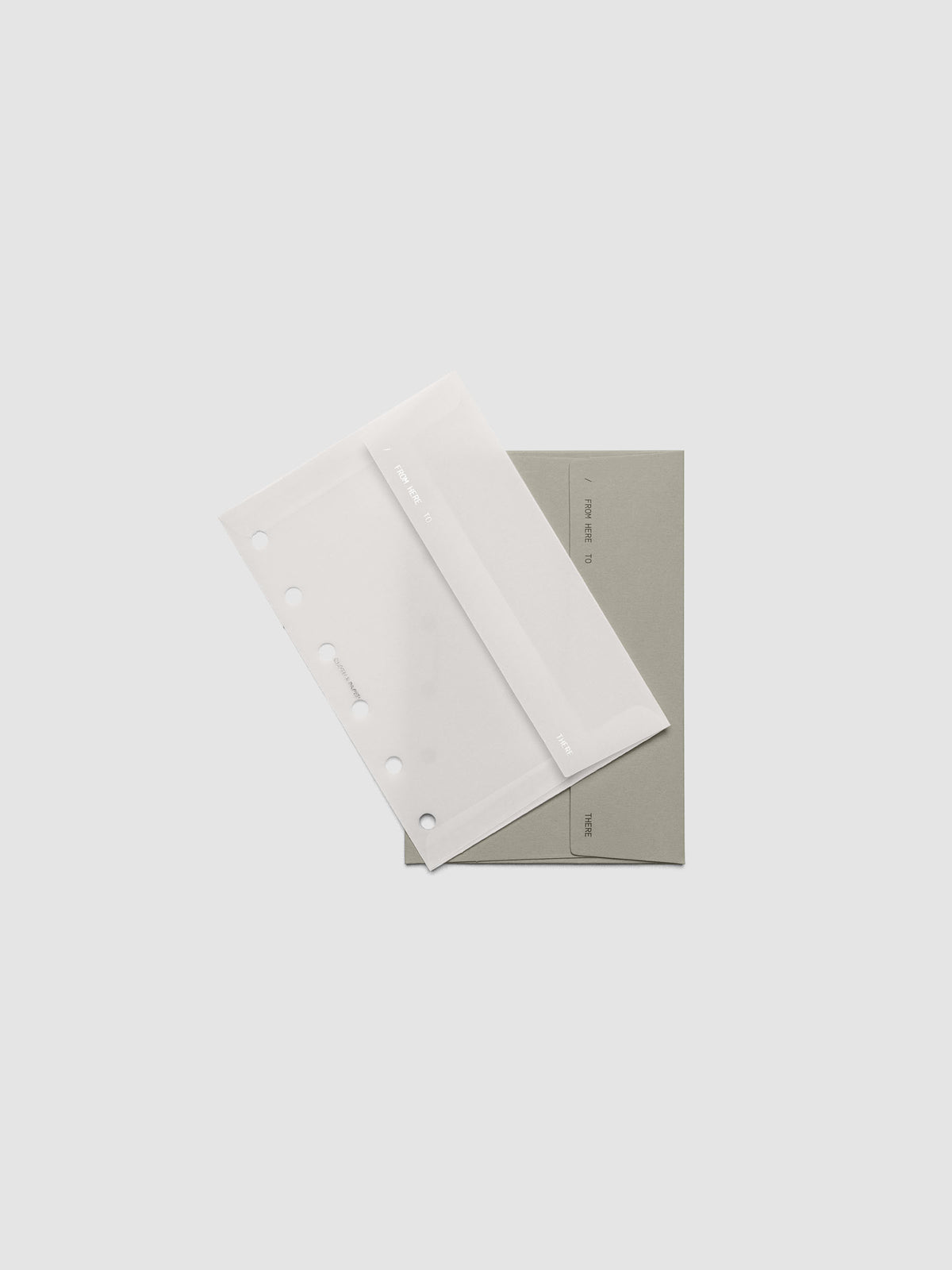 Envelope Storage Holder Set shown pre-punched for Pocket 6-Ring planners.