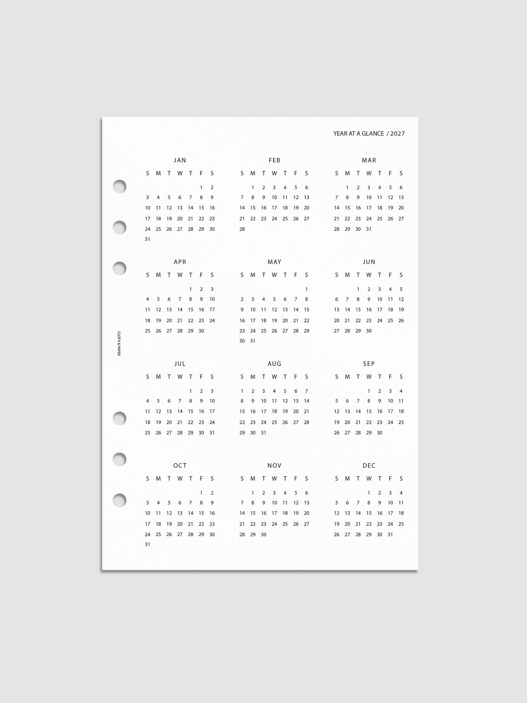 2027 Year At A Glance Dashboard Sunday Start, A5 6-Ring Punch, translucent vellum dashboard printed with a full 2027 year-at-a-glance calendar in Sunday-start format