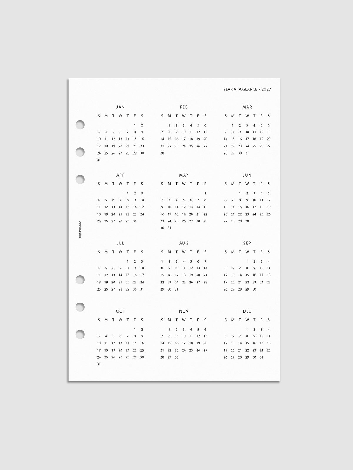2027 Year At A Glance Dashboard Sunday Start, A5 6-Ring Punch, translucent vellum dashboard printed with a full 2027 year-at-a-glance calendar in Sunday-start format